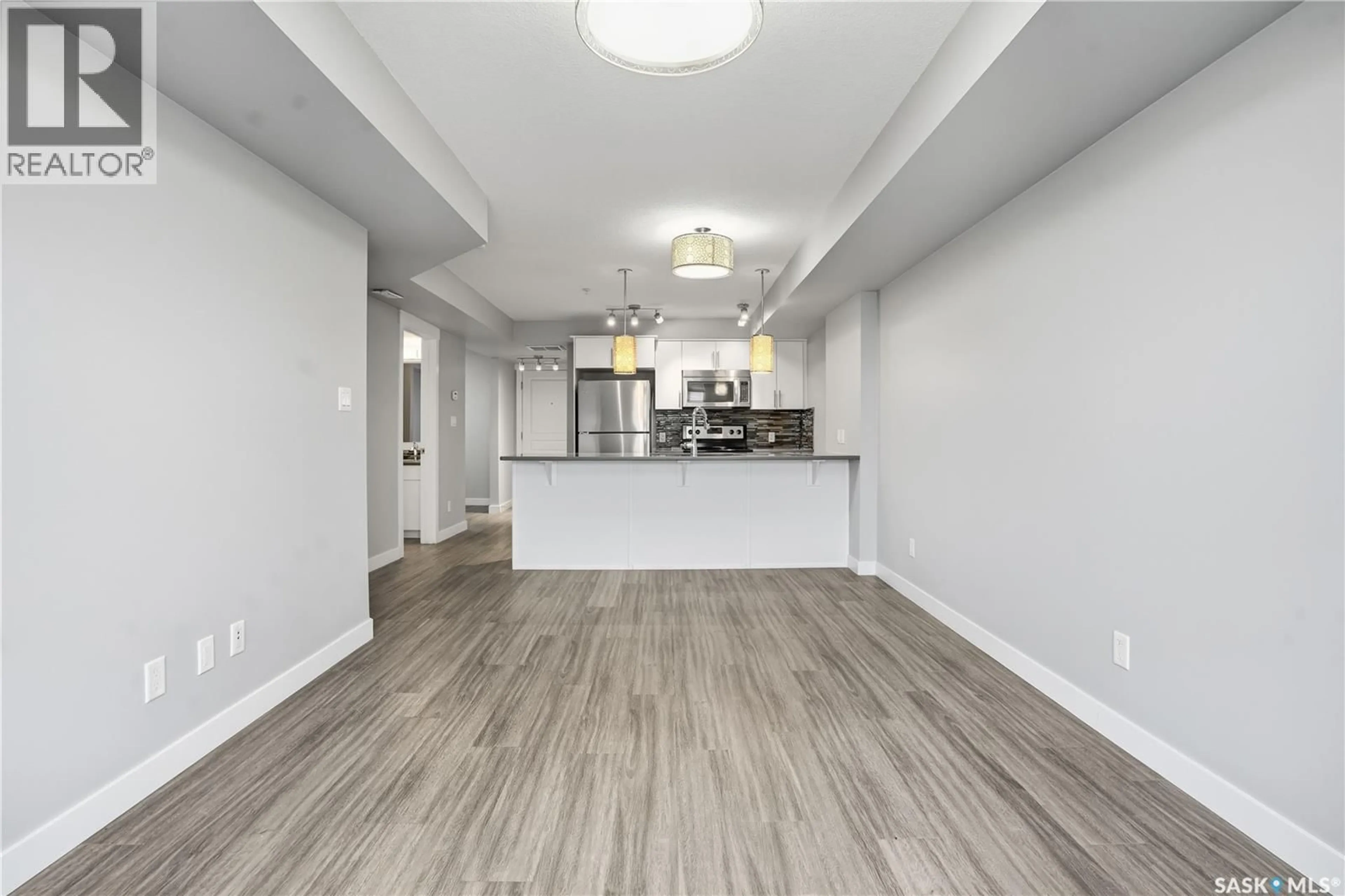 Open concept kitchen, unknown for 207 - 5301 UNIVERSAL CRESCENT, Regina Saskatchewan S4W0L2