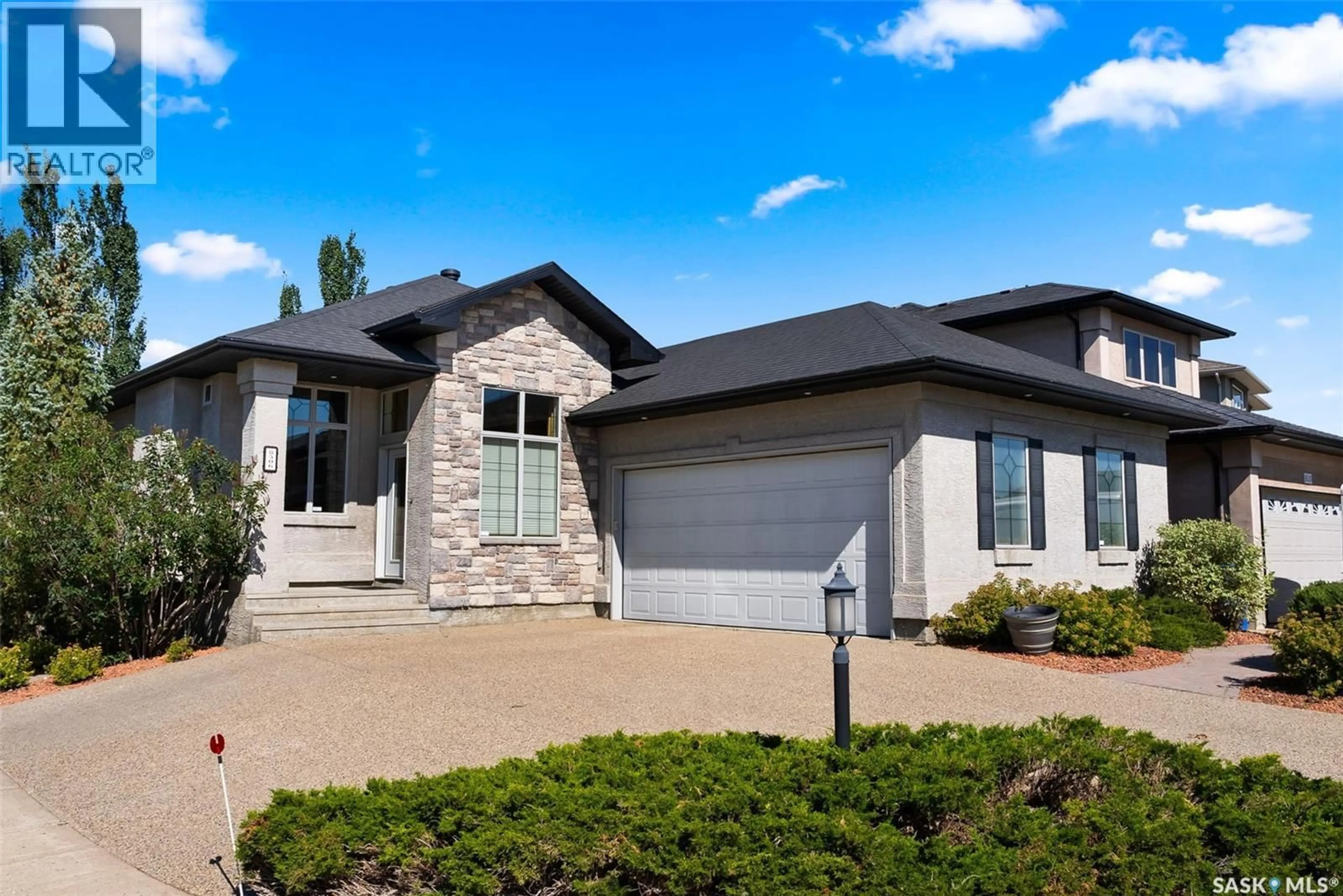 Home with brick exterior material, street for 8506 WASCANA GARDENS ROAD, Regina Saskatchewan S4V1G1