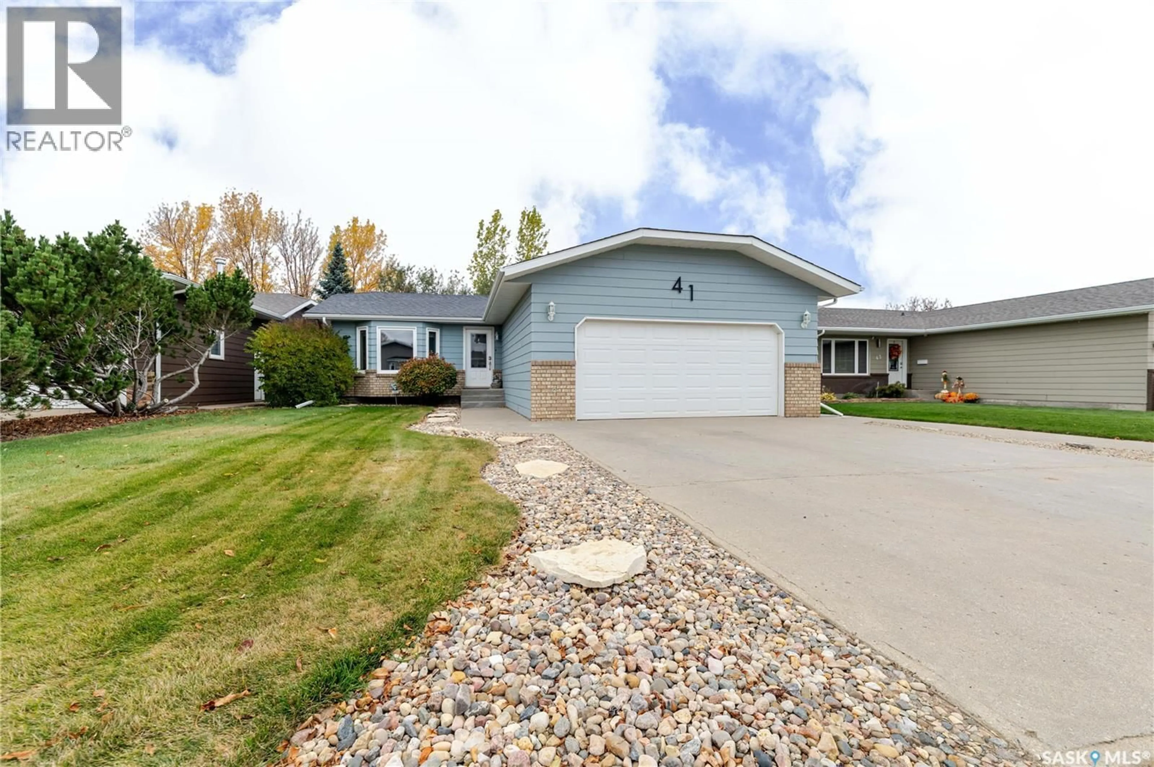 Home with vinyl exterior material, street for 41 TAYLOR CRESCENT, Moose Jaw Saskatchewan S6J1J6