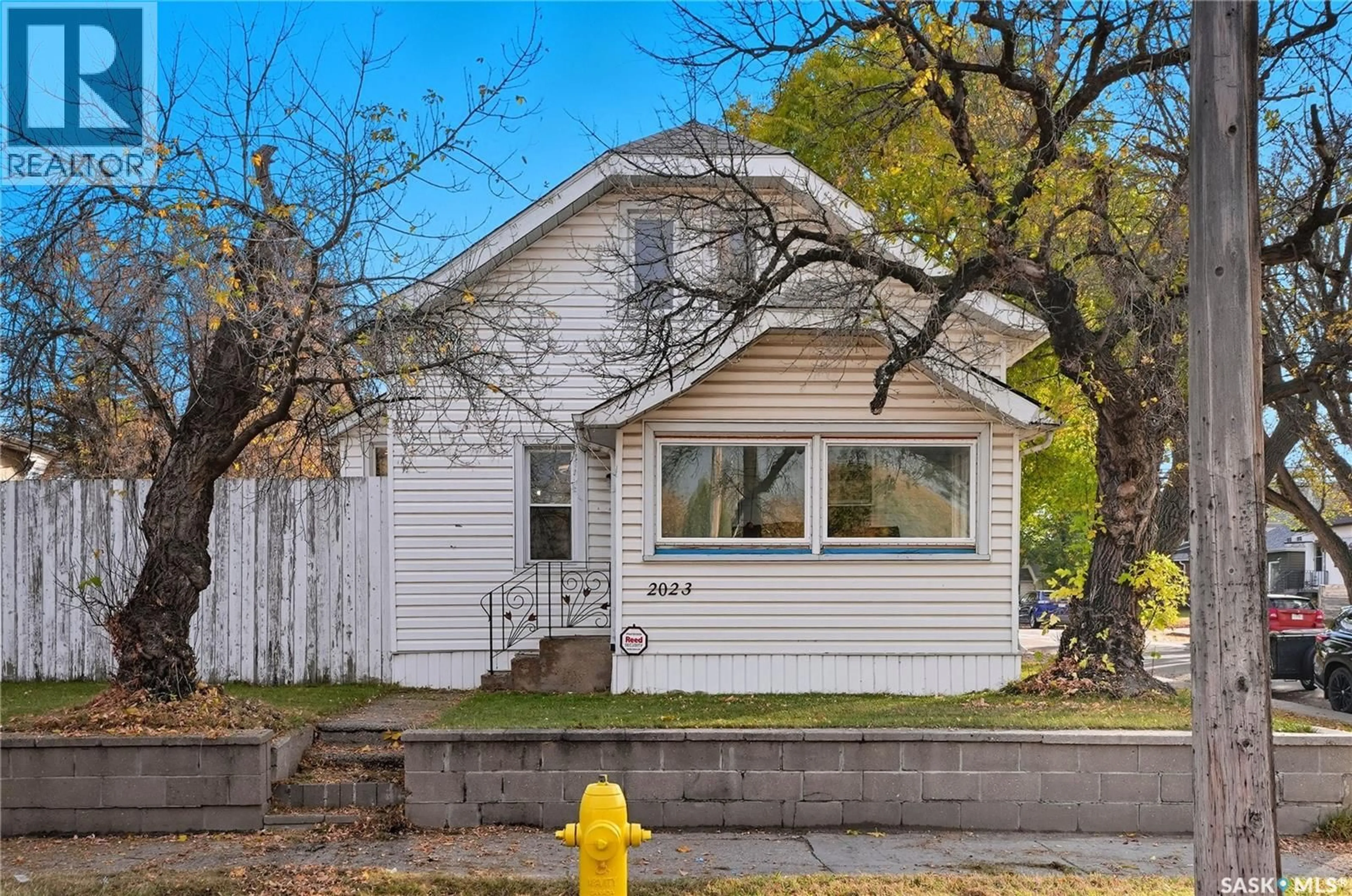 Home with vinyl exterior material, street for 2023 20TH STREET, Saskatoon Saskatchewan S7M1A5