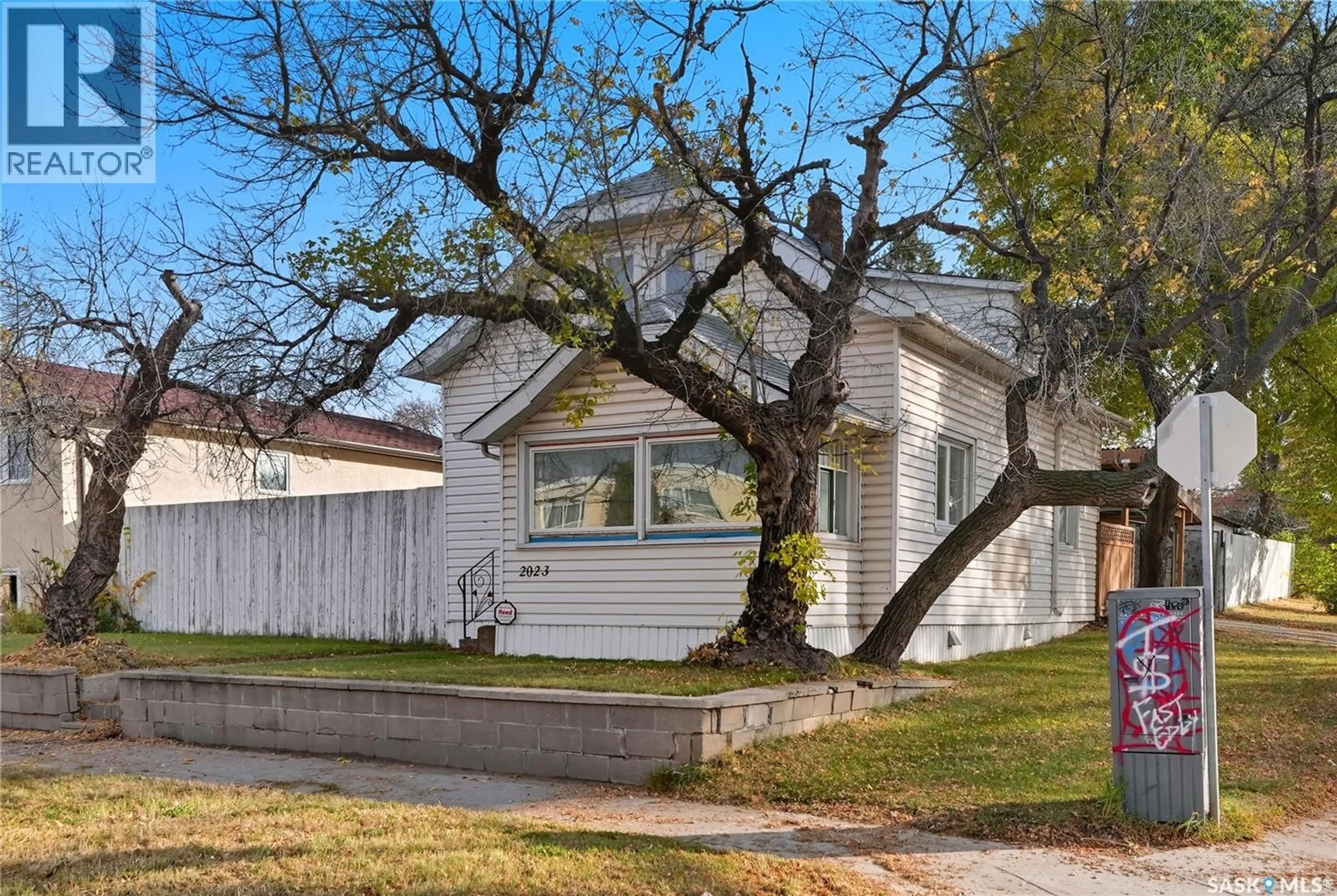 Home with vinyl exterior material, street for 2023 20TH STREET, Saskatoon Saskatchewan S7M1A5