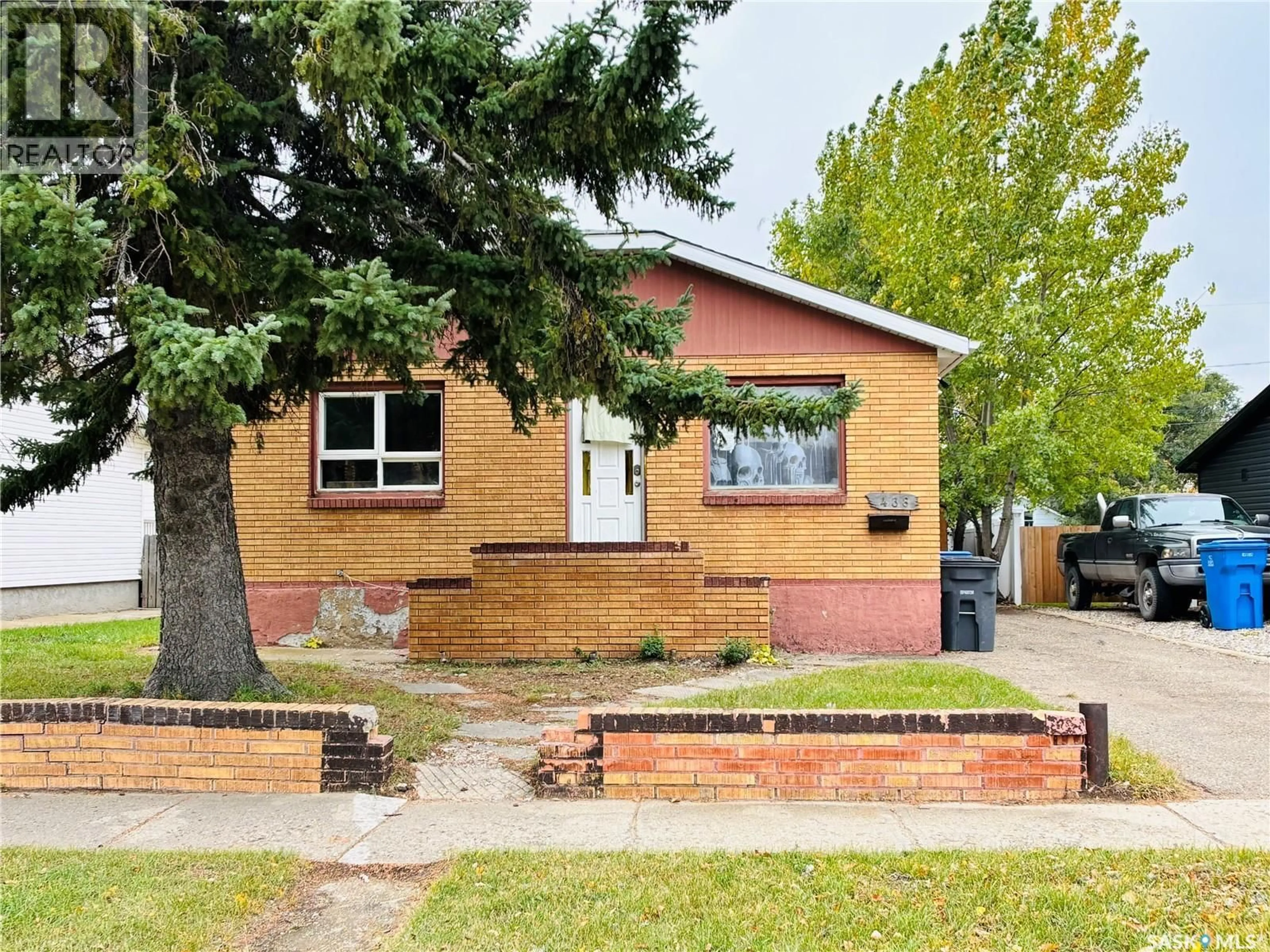 Home with brick exterior material, street for 438 3RD STREET, Estevan Saskatchewan S4A0P2
