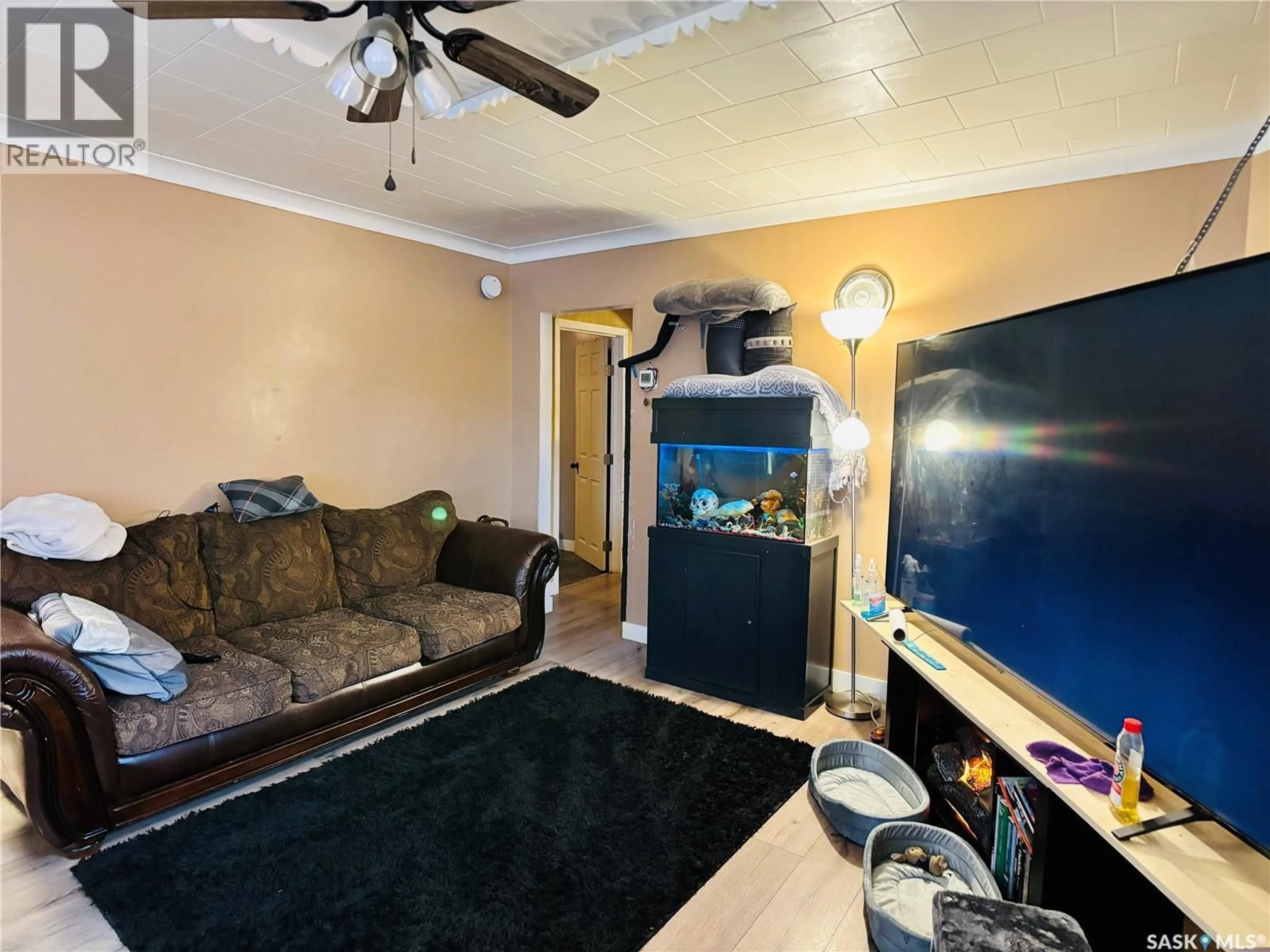 Living room with furniture, unknown for 438 3RD STREET, Estevan Saskatchewan S4A0P2