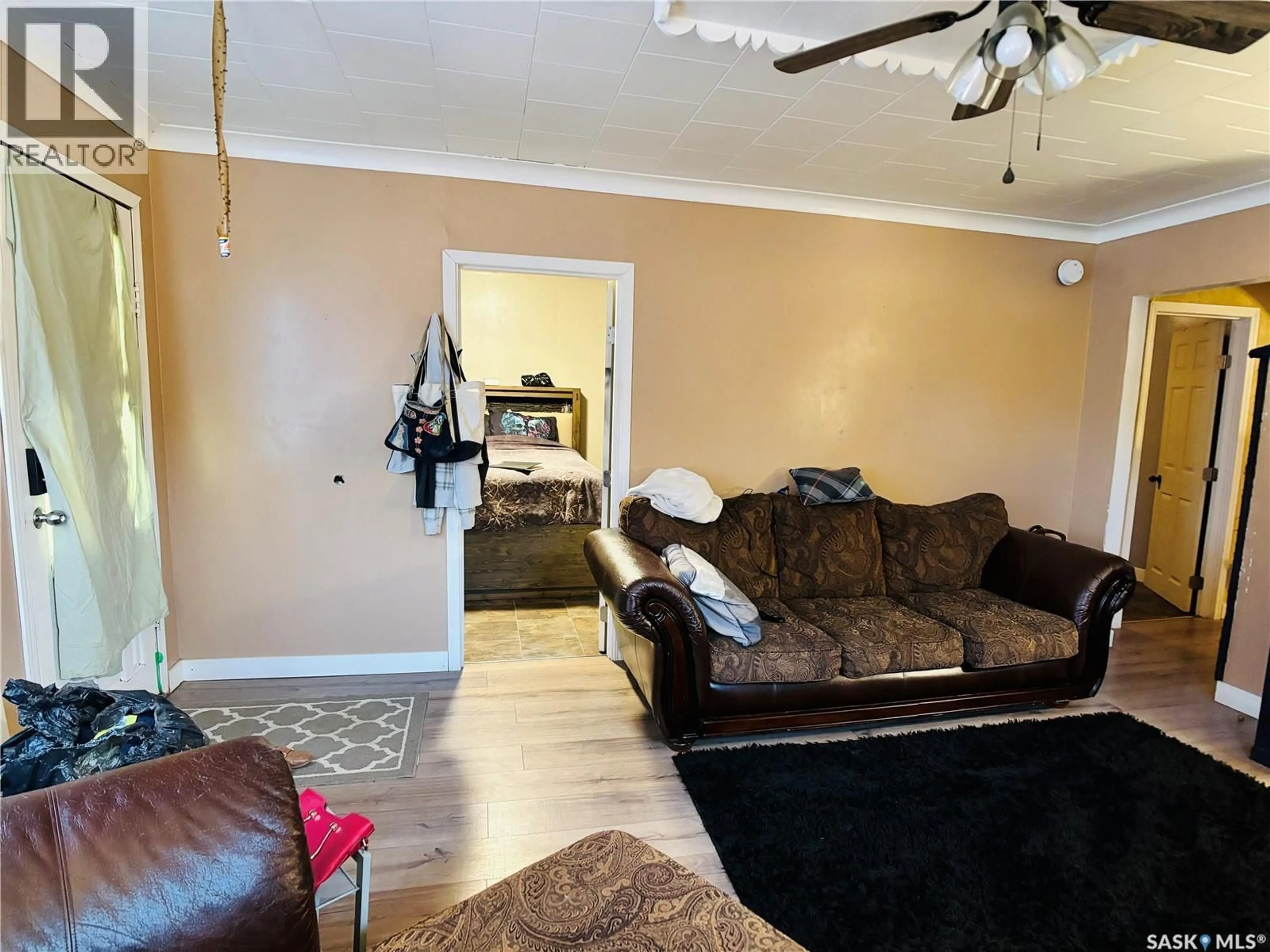Living room with furniture, unknown for 438 3RD STREET, Estevan Saskatchewan S4A0P2