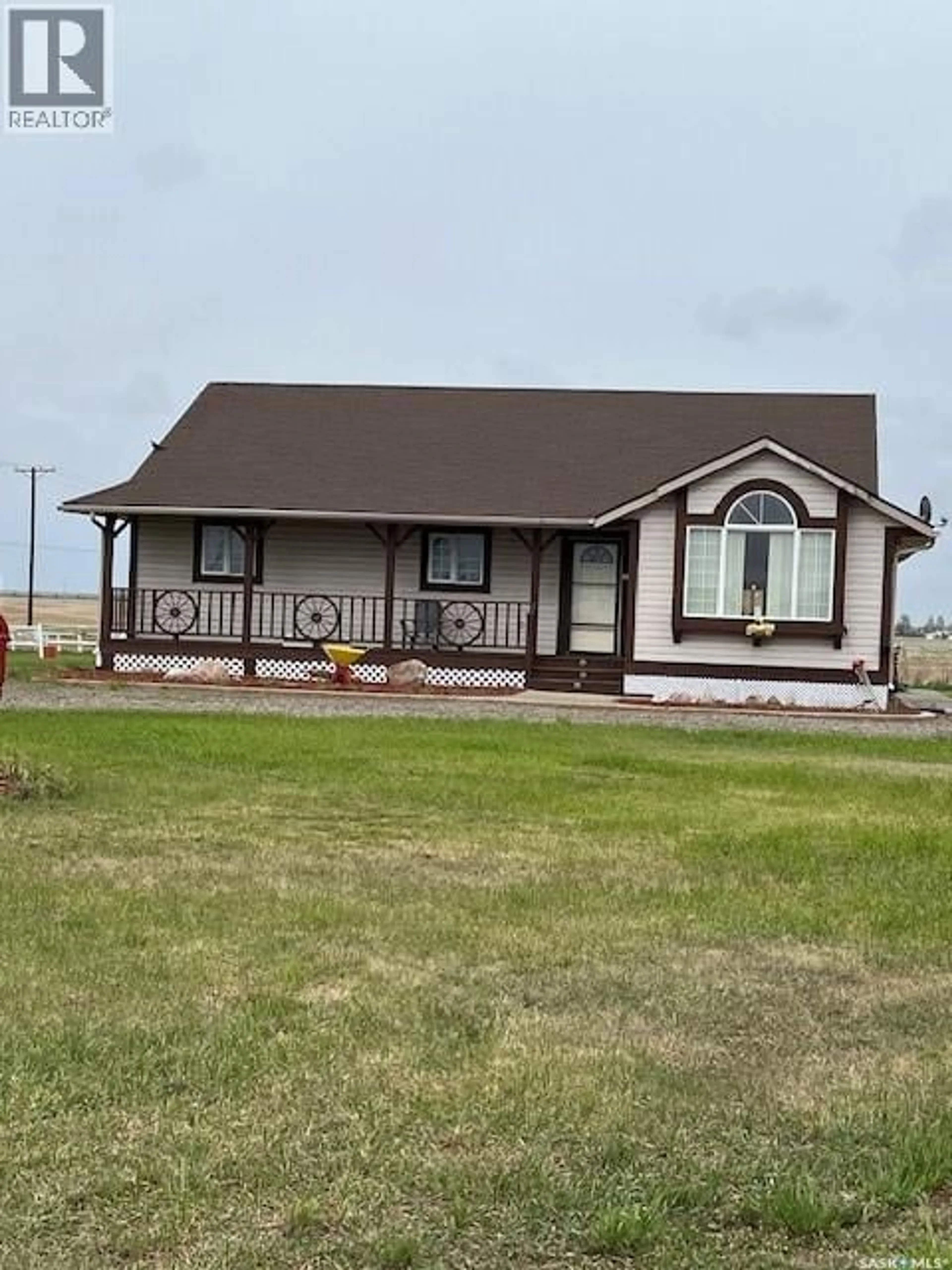 Home with vinyl exterior material, building for LAZY T STABLES, Vanscoy Rm No. 345 Saskatchewan S0K1V0