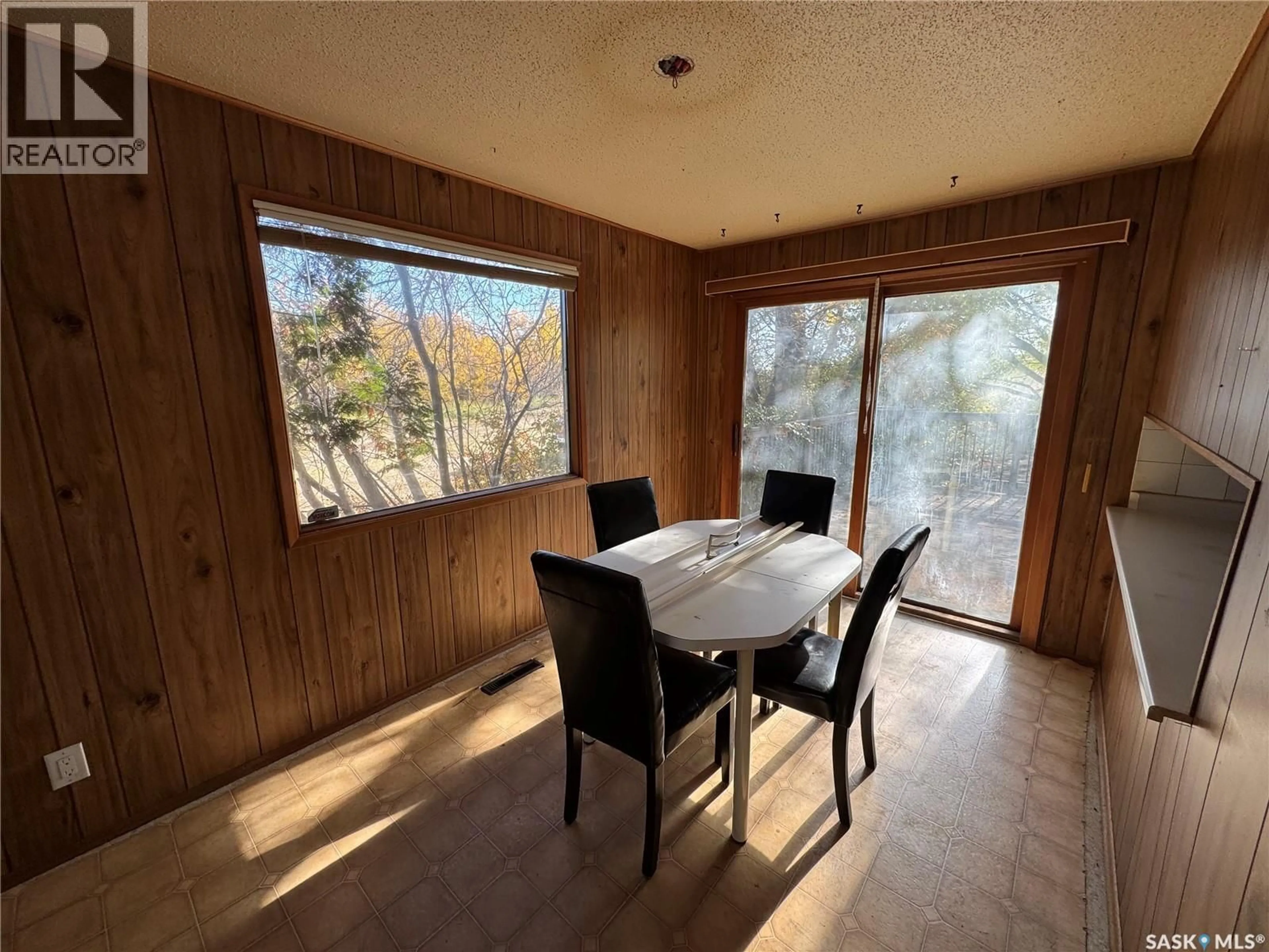 Dining room, wood/laminate floor for 201 HILLVIEW AVENUE, Birch Hills Saskatchewan S0J0G0