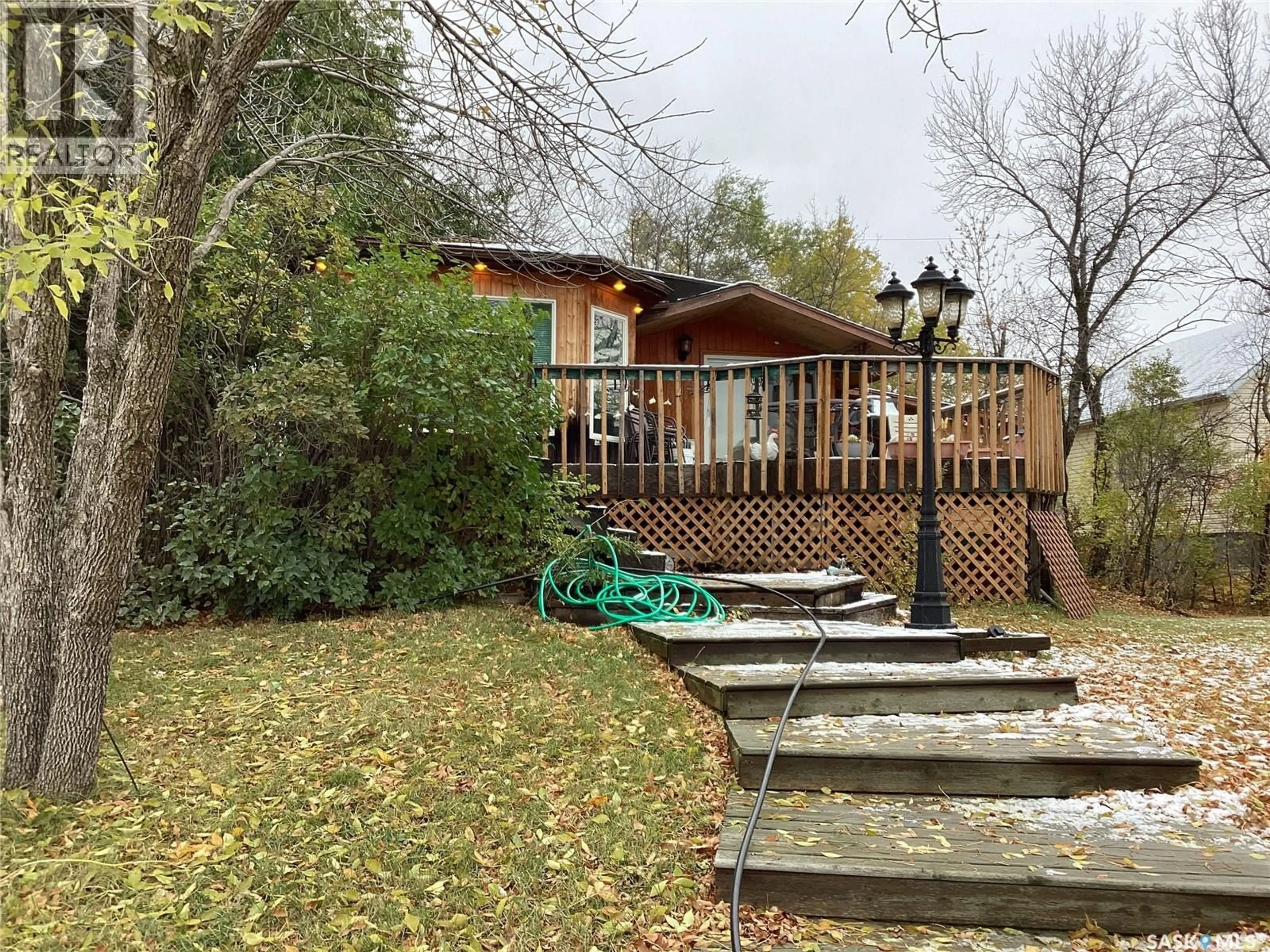 A pic from outside/outdoor area/front of a property/back of a property/a pic from drone, unknown for 704 GROVE AVENUE, Saskatchewan Beach Saskatchewan S0G4L0
