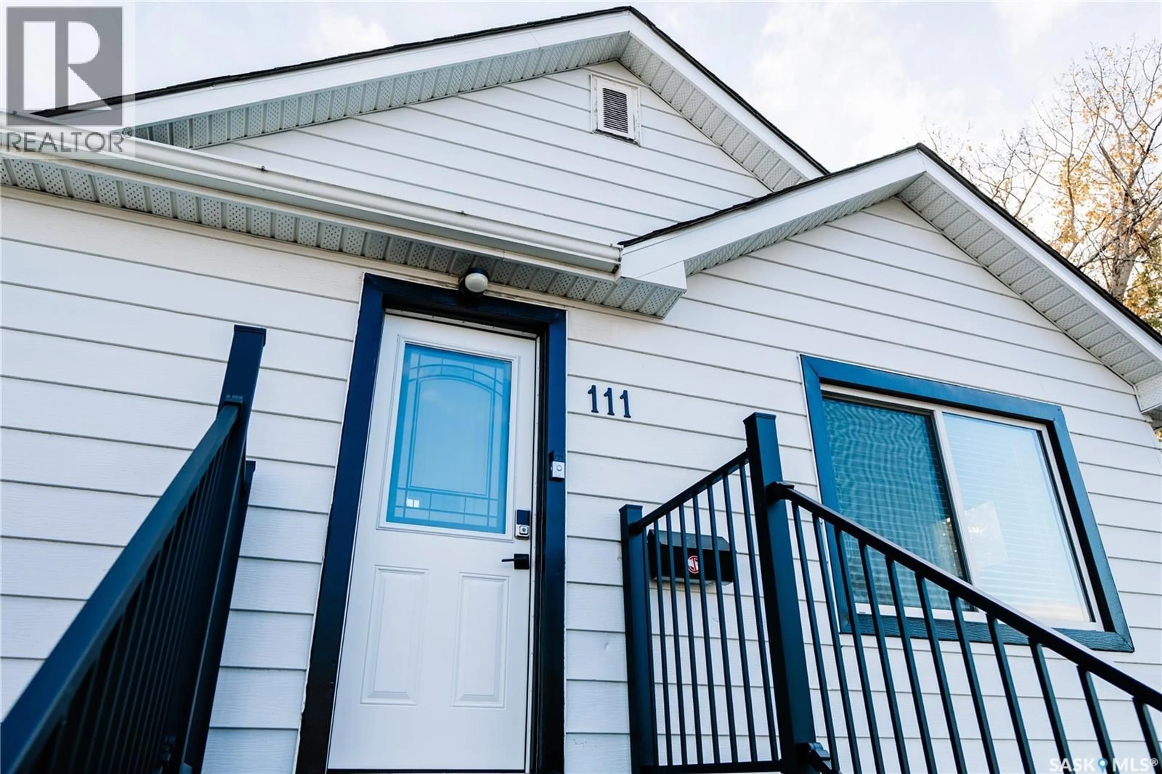Home with vinyl exterior material, street for 111 COLLEGE AVENUE, Regina Saskatchewan S4N0W4