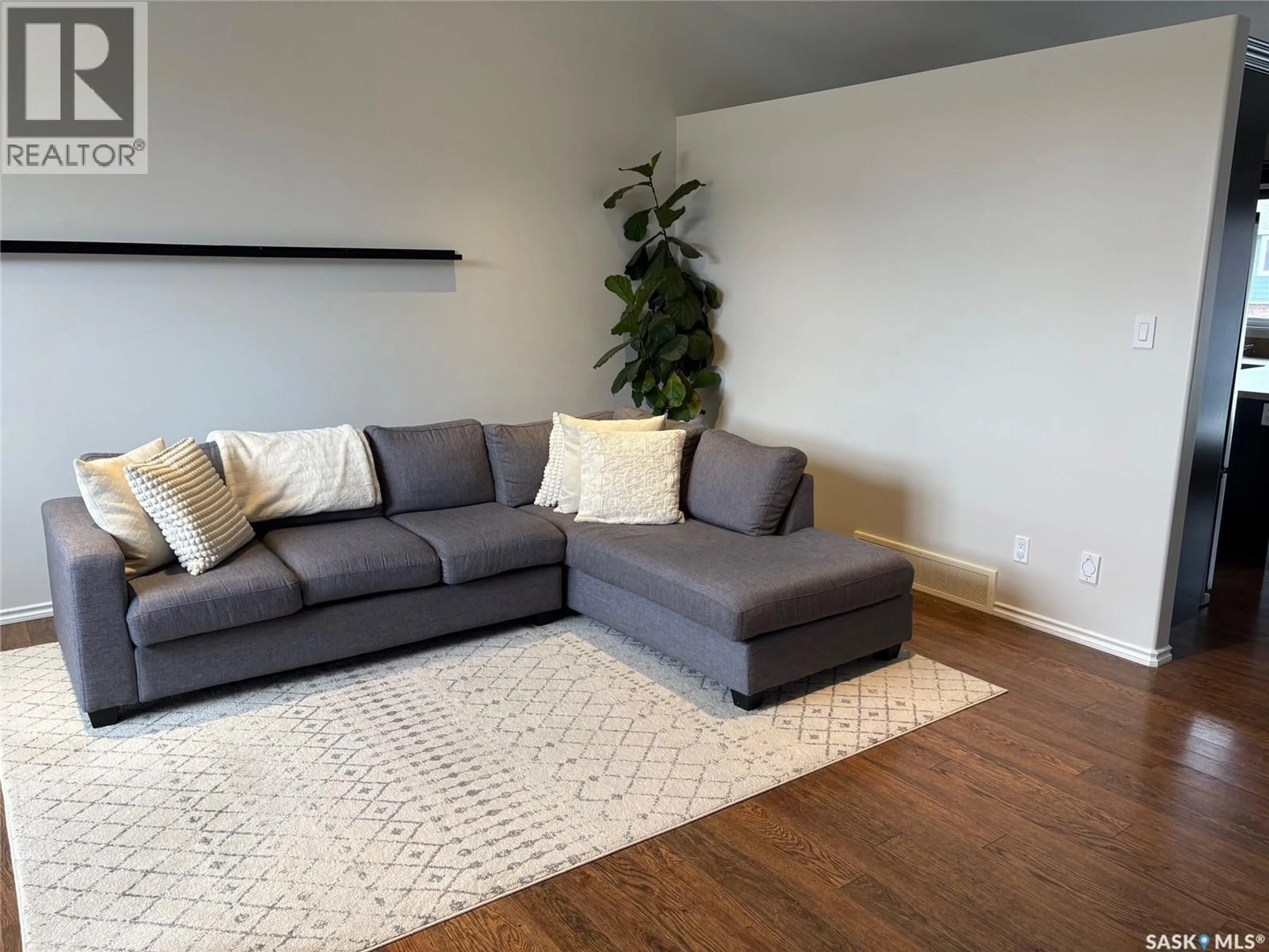 Living room with furniture, unknown for 58 WHITESAND DRIVE, Yorkton Saskatchewan S3N0E6