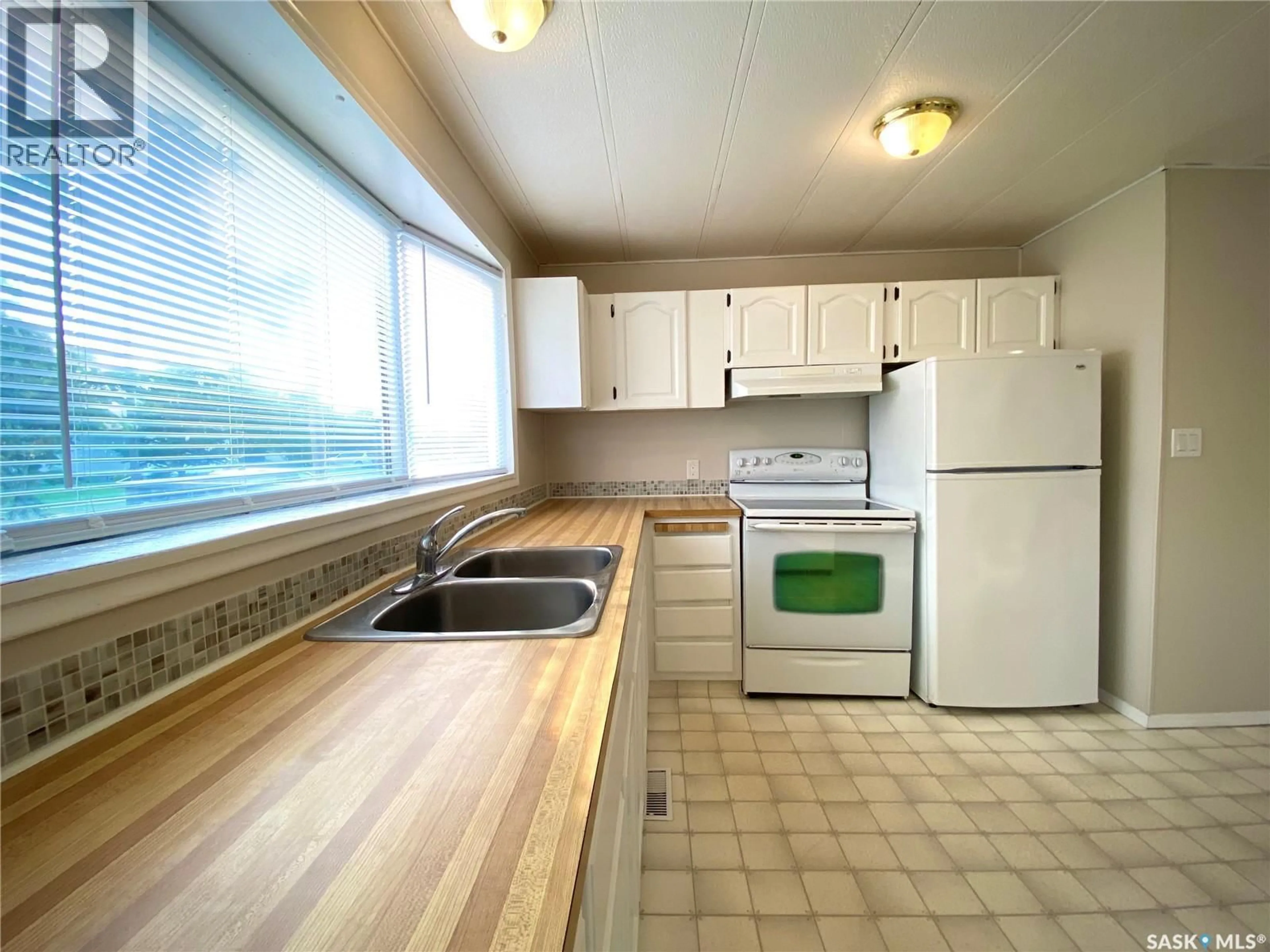 Standard kitchen, wood/laminate floor for 305 ALLAN AVENUE, Saltcoats Saskatchewan S0A3R0