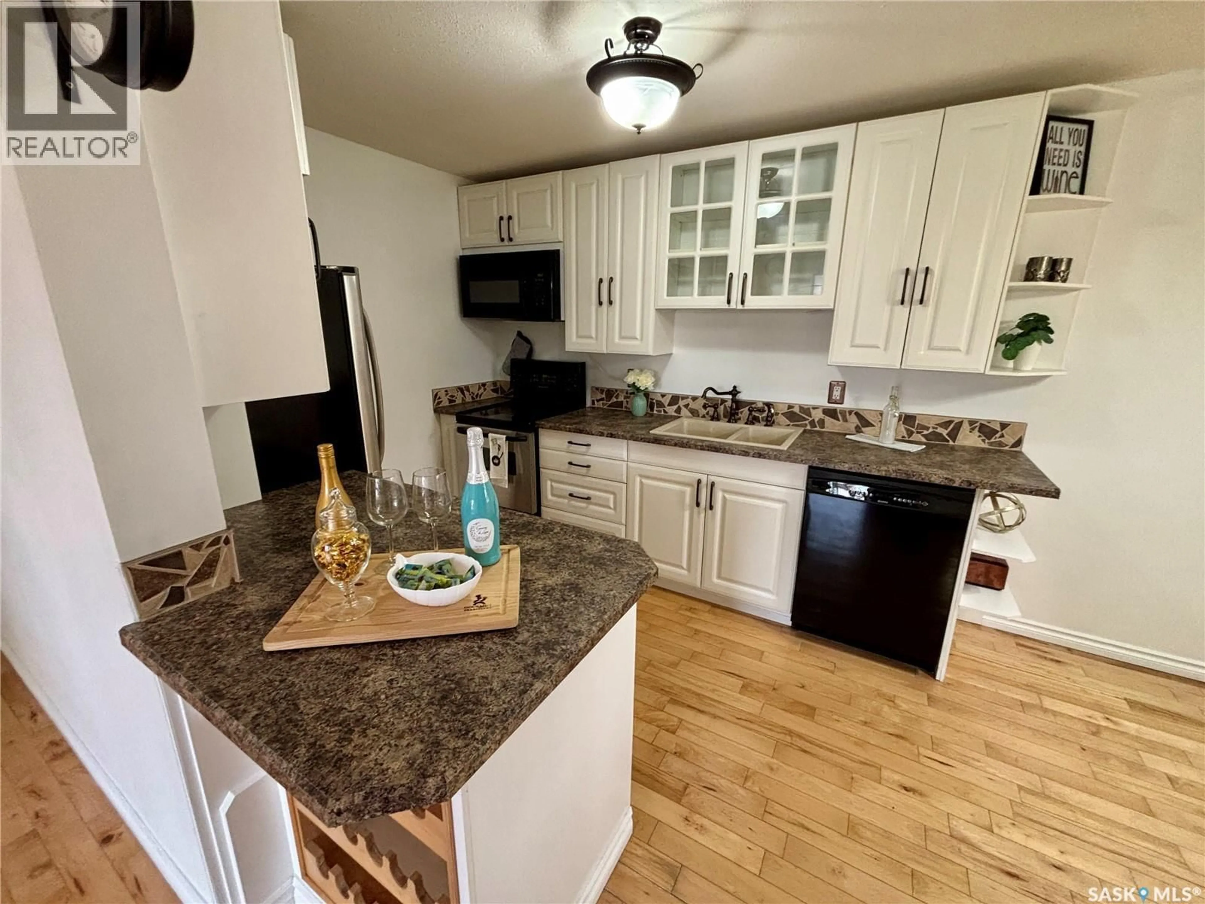 Open concept kitchen, unknown for 106 - 2931 HARDING STREET, Regina Saskatchewan S4V1B9