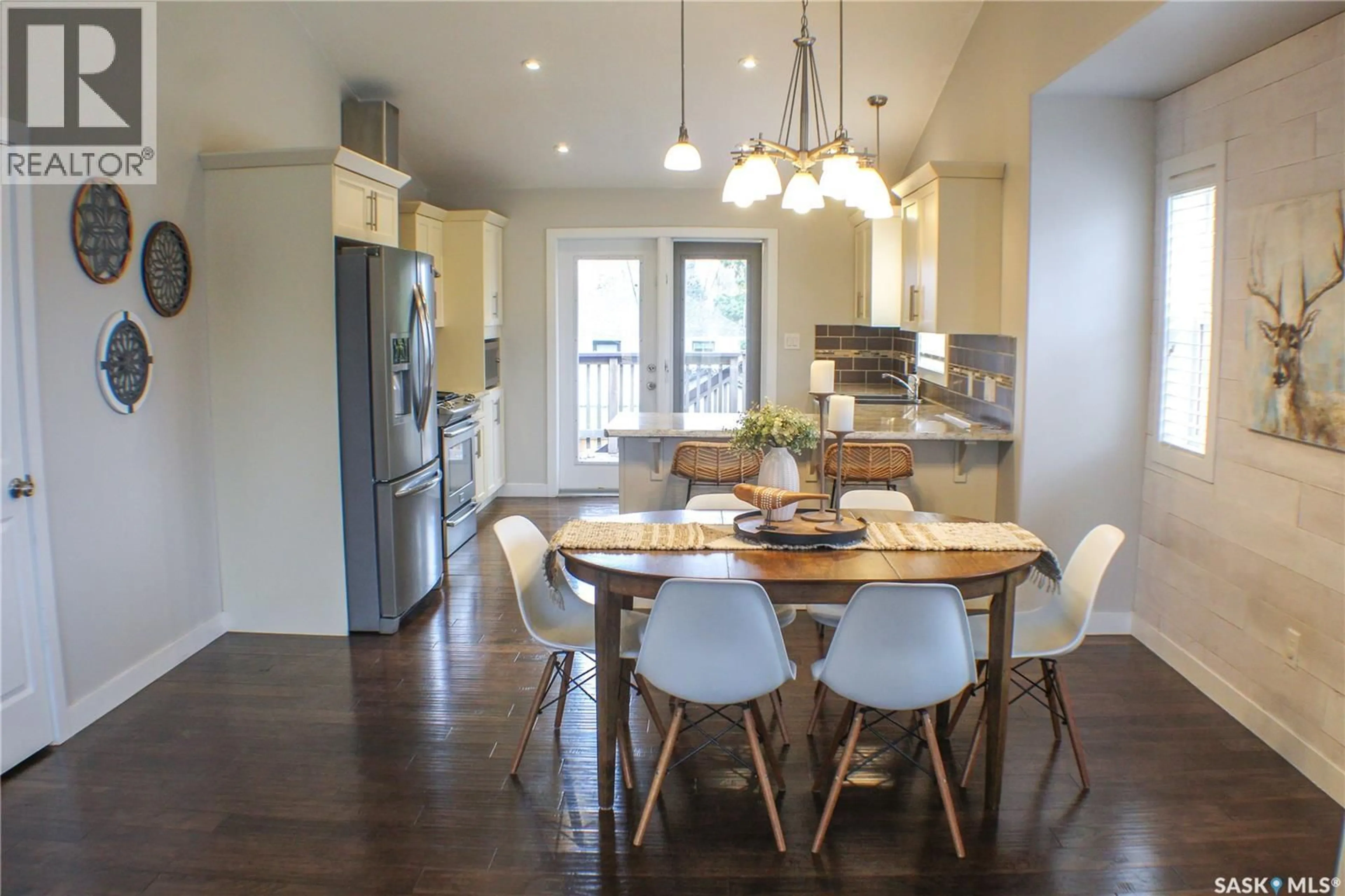 Open concept kitchen, wood/laminate floor for 302 HIGGINS AVENUE, Melfort Saskatchewan S0E1A0