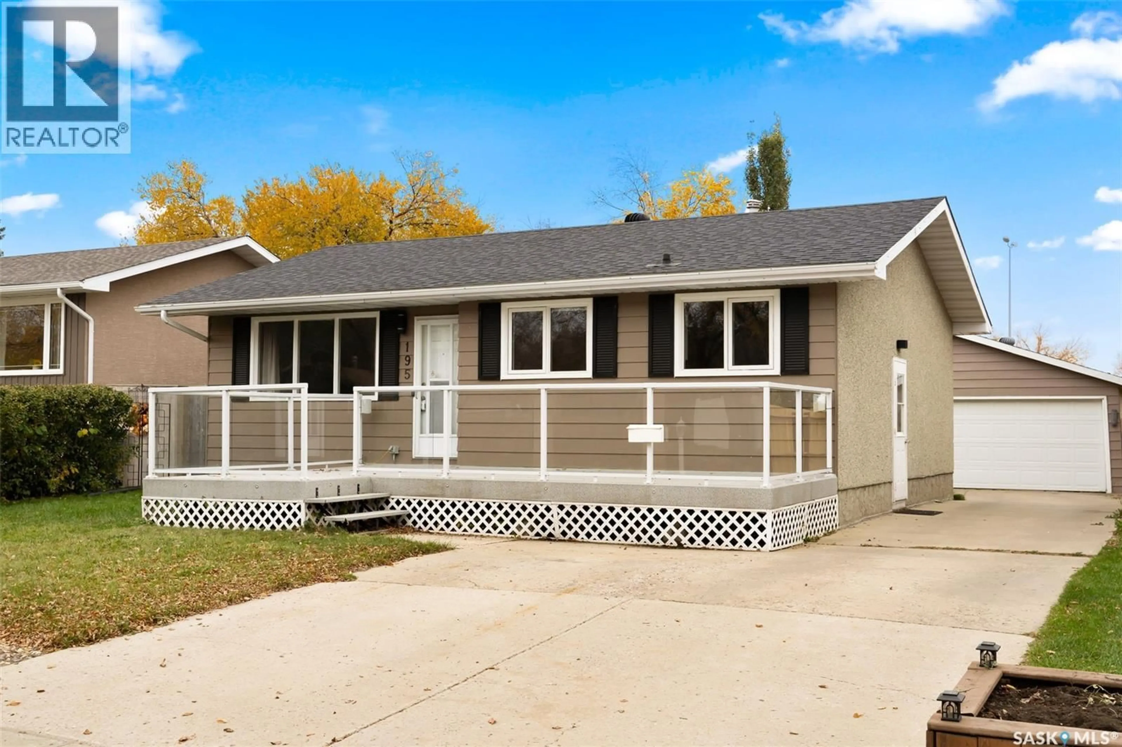 Home with vinyl exterior material, street for 195 MARKWELL DRIVE, Regina Saskatchewan S4X1K5