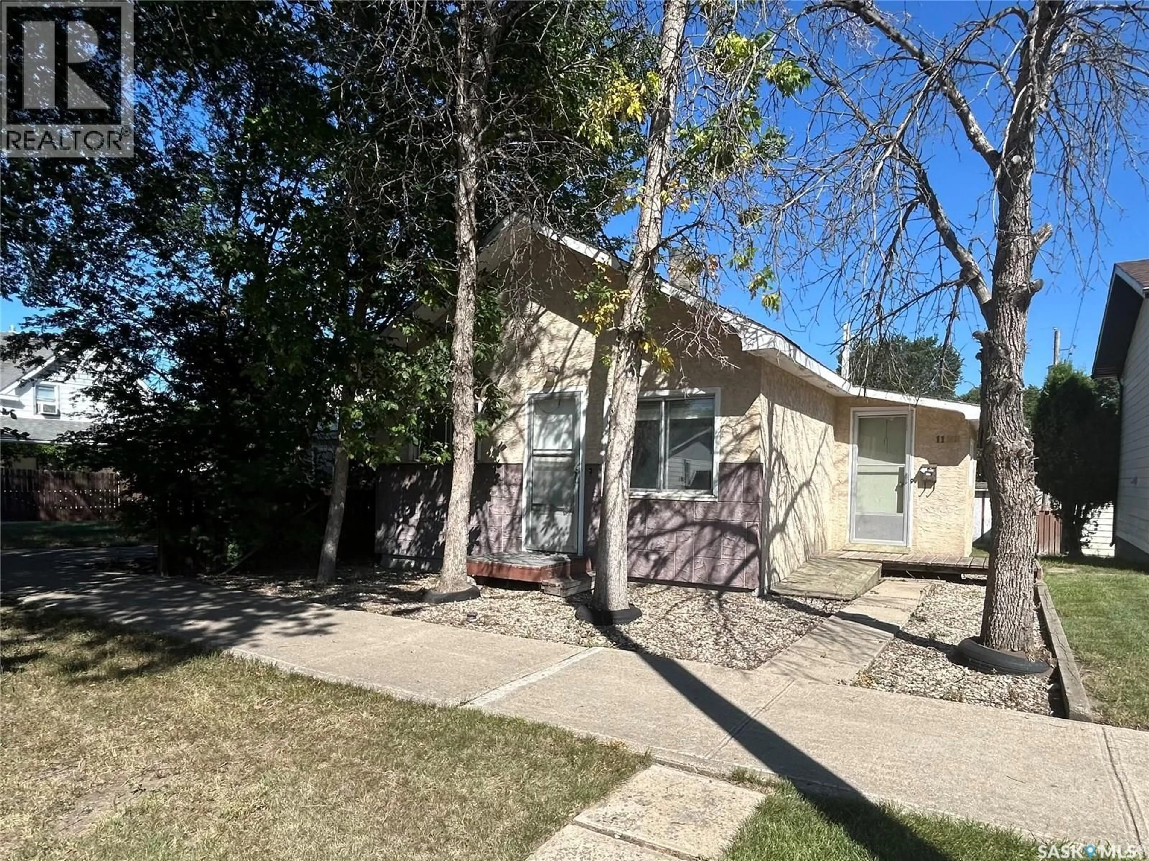 A pic from outside/outdoor area/front of a property/back of a property/a pic from drone, street for 1122 IROQUOIS STREET, Moose Jaw Saskatchewan S6H5B9