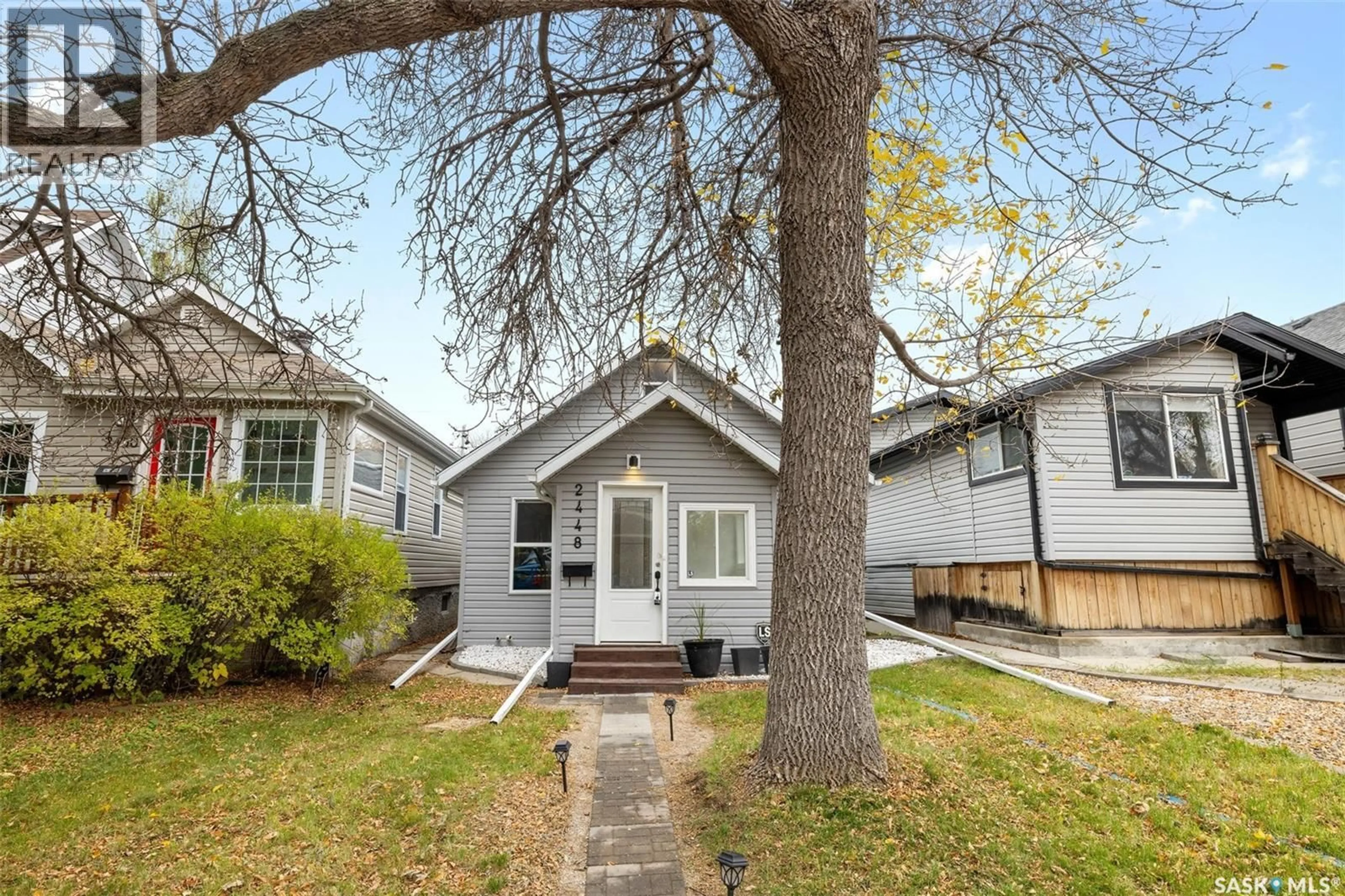 Home with vinyl exterior material, street for 2448 ATKINSON STREET, Regina Saskatchewan S4N3X5