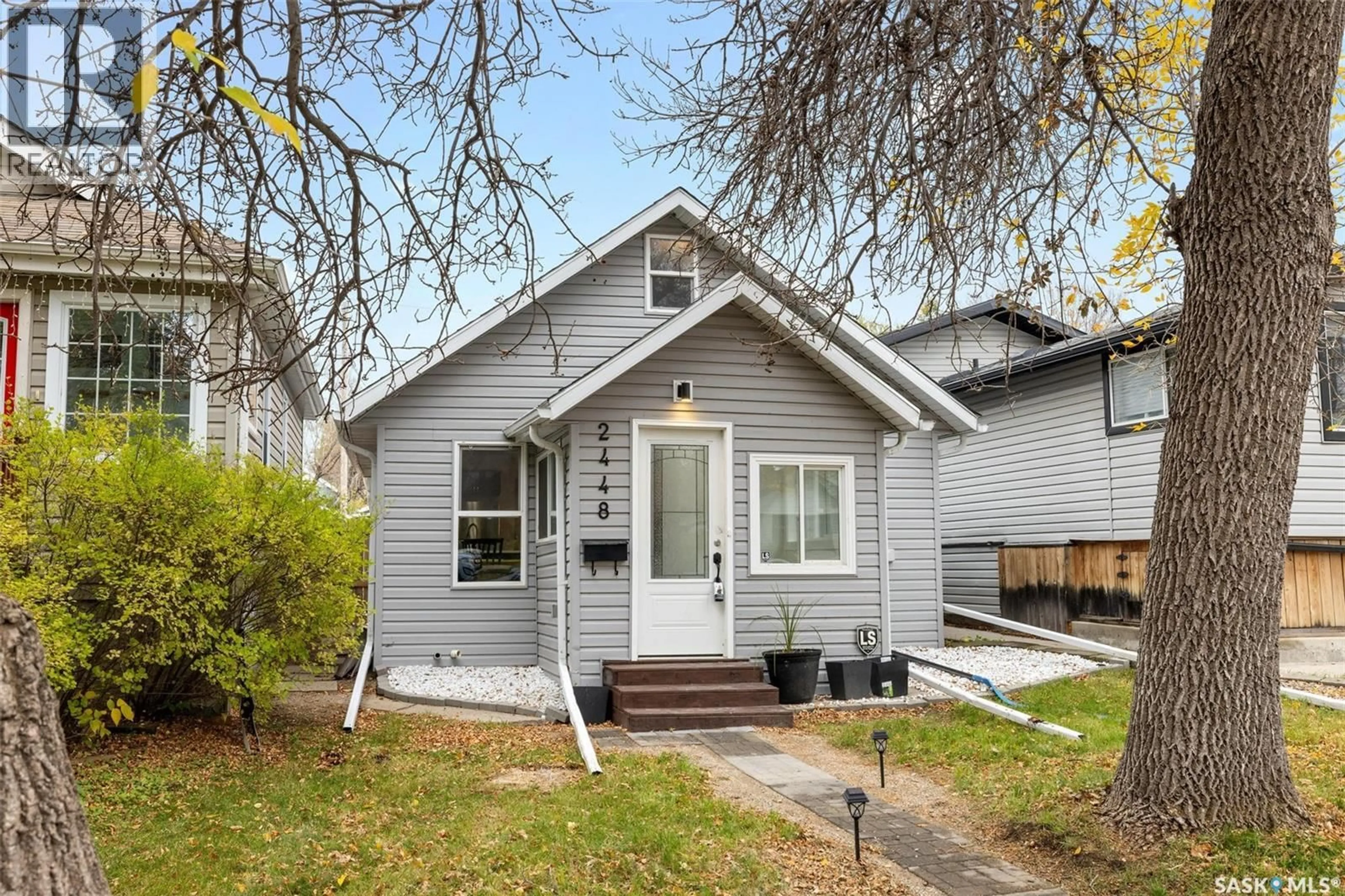 Home with vinyl exterior material, street for 2448 ATKINSON STREET, Regina Saskatchewan S4N3X5