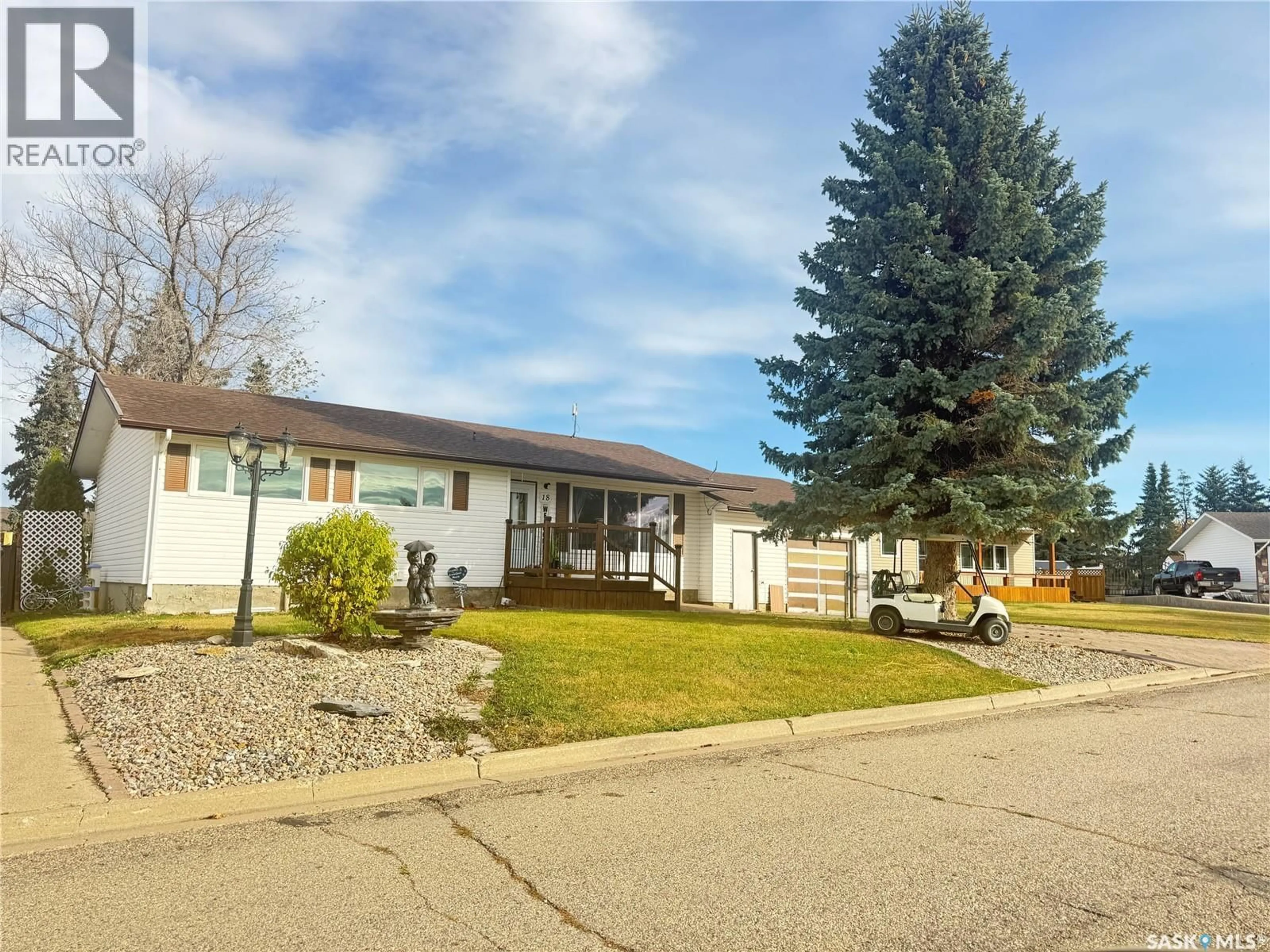 Home with vinyl exterior material, street for 18 TUFTS CRESCENT, Outlook Saskatchewan S0L2N0