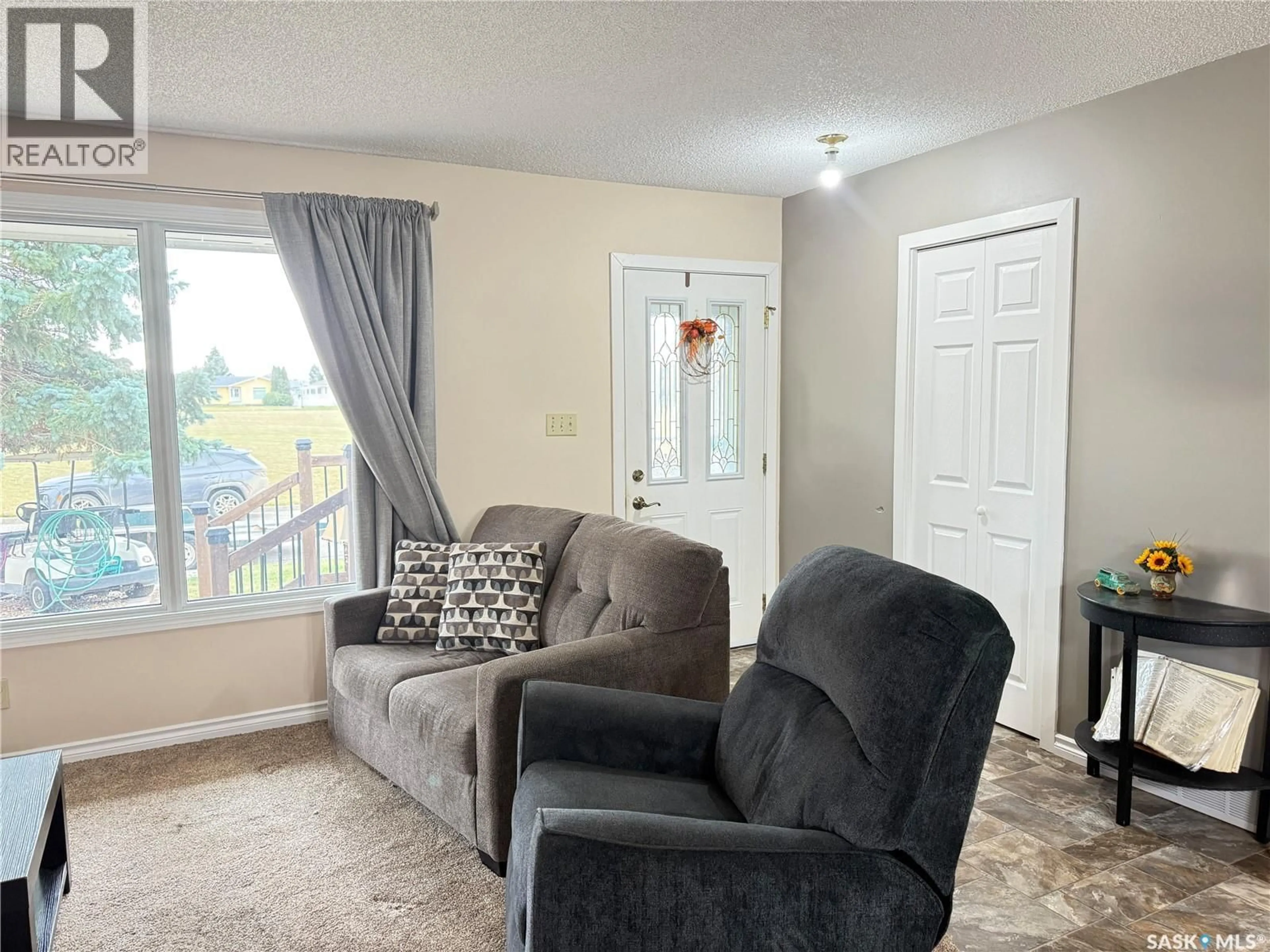Living room with furniture, unknown for 18 TUFTS CRESCENT, Outlook Saskatchewan S0L2N0