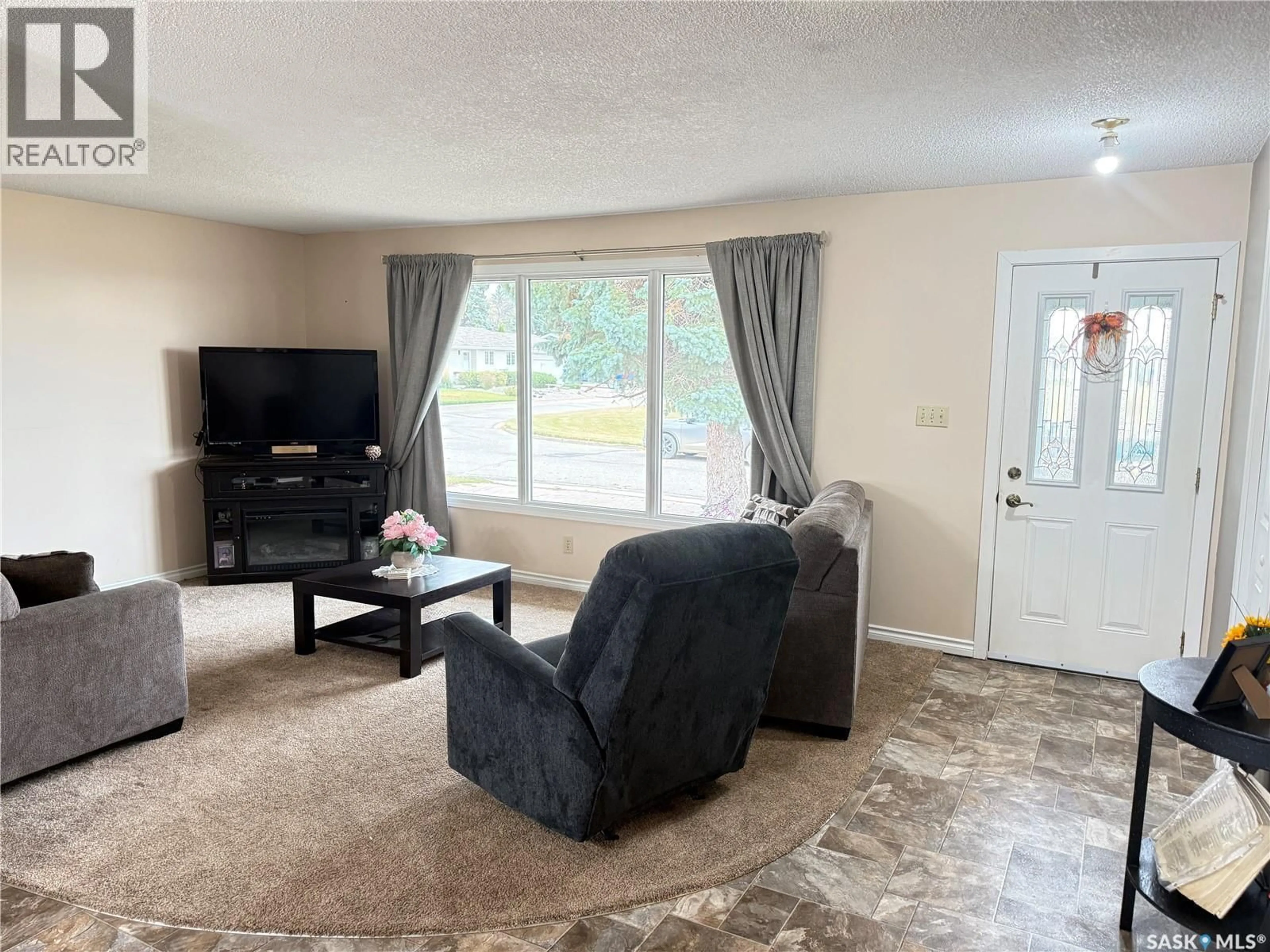 Living room with furniture, unknown for 18 TUFTS CRESCENT, Outlook Saskatchewan S0L2N0
