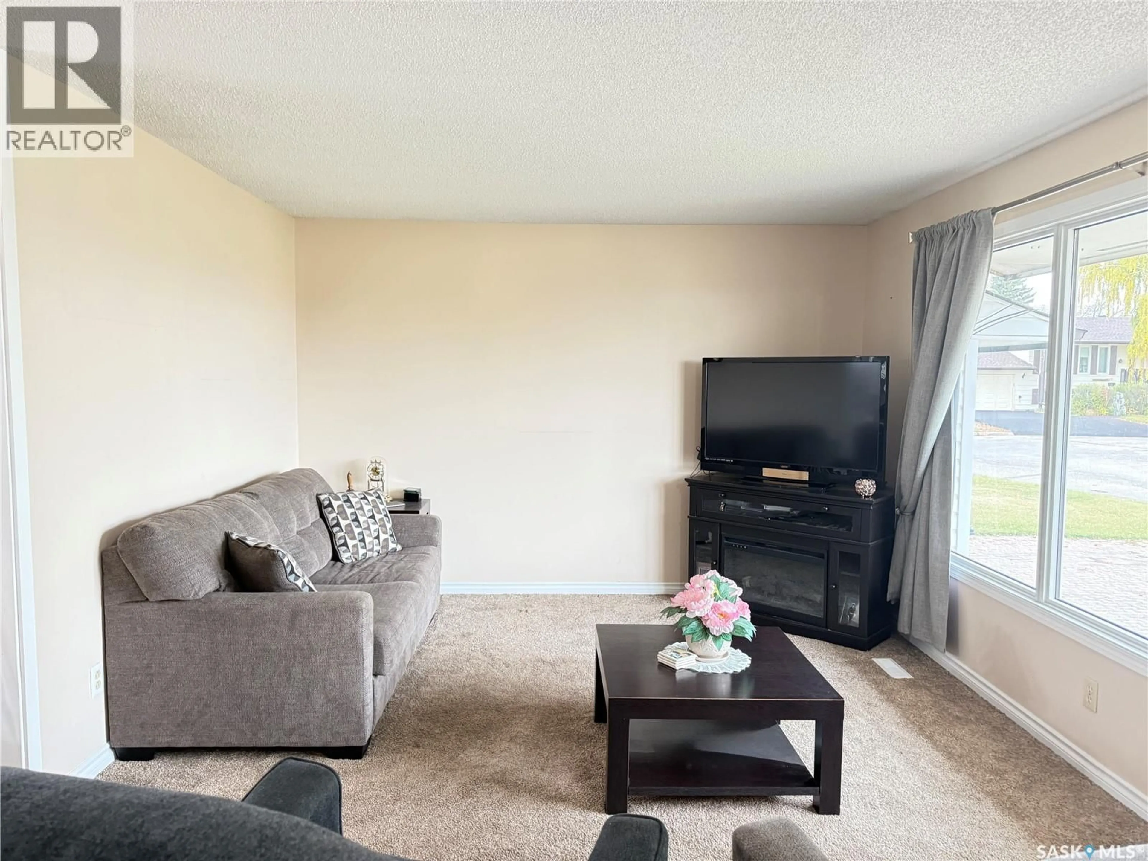 Living room with furniture, unknown for 18 TUFTS CRESCENT, Outlook Saskatchewan S0L2N0