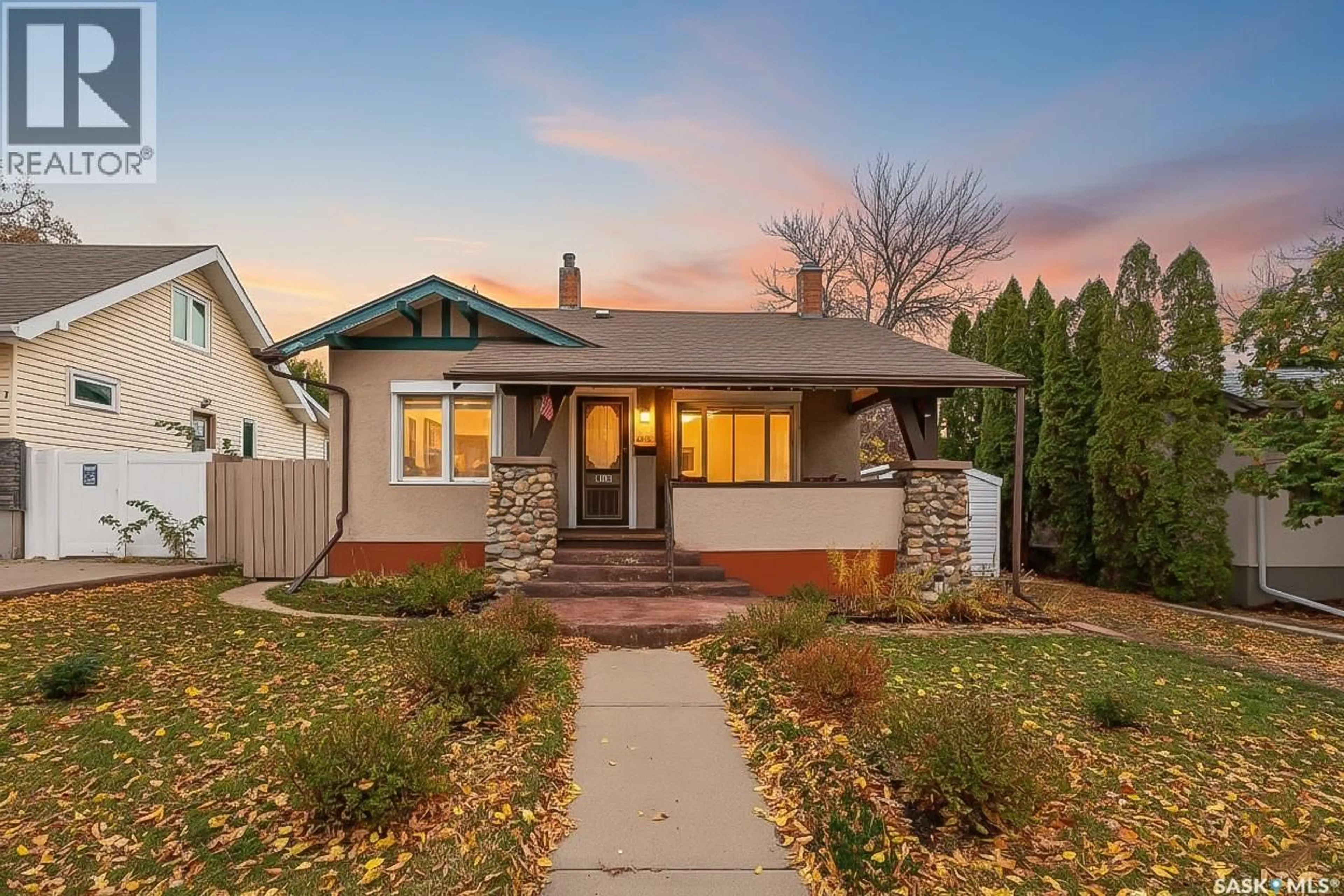 Home with brick exterior material, street for 1105 3RD AVENUE, Moose Jaw Saskatchewan S6H3V1