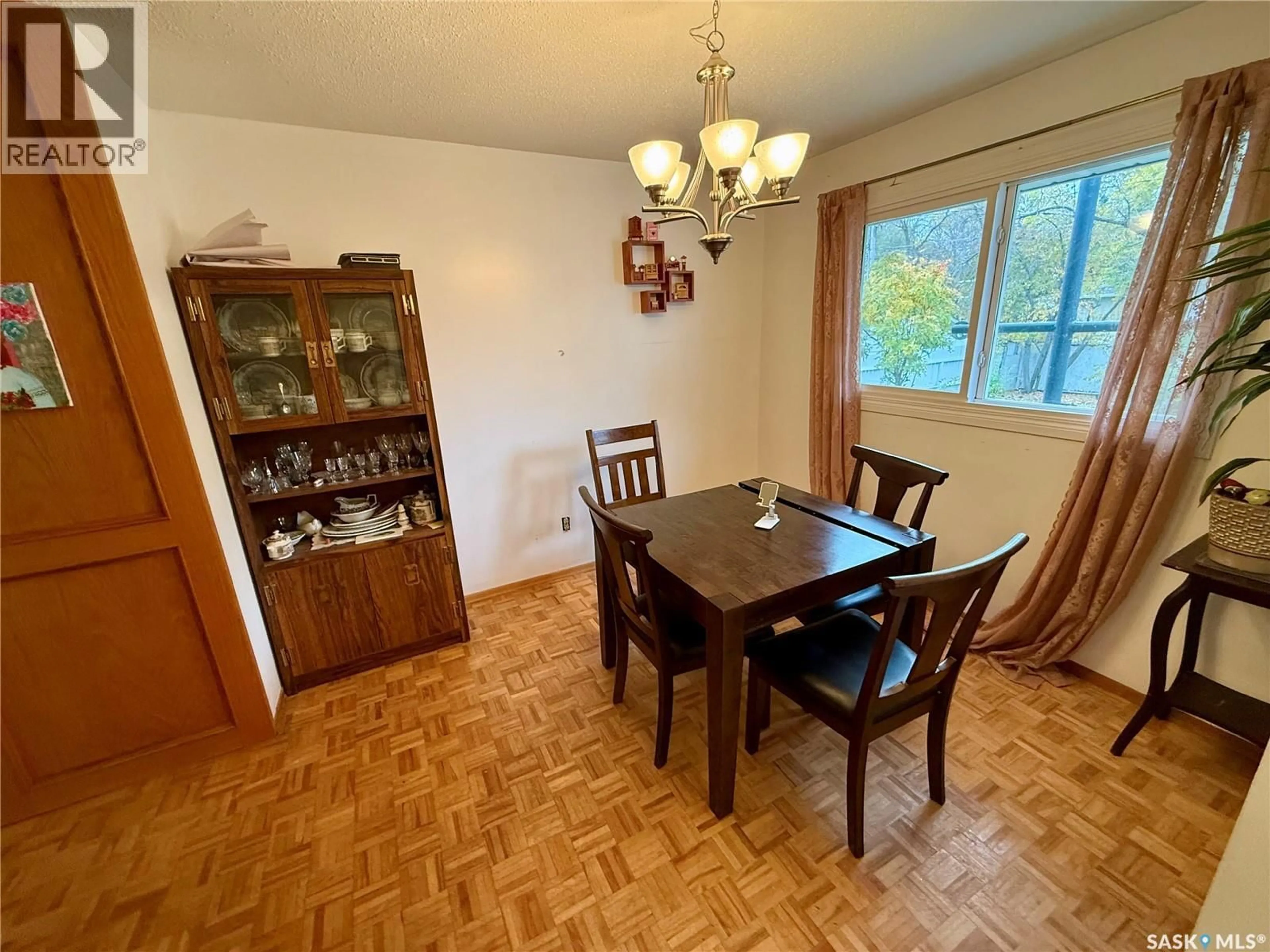 Dining room, wood/laminate floor for 7 HYDE AVENUE, Regina Saskatchewan S4R3X8