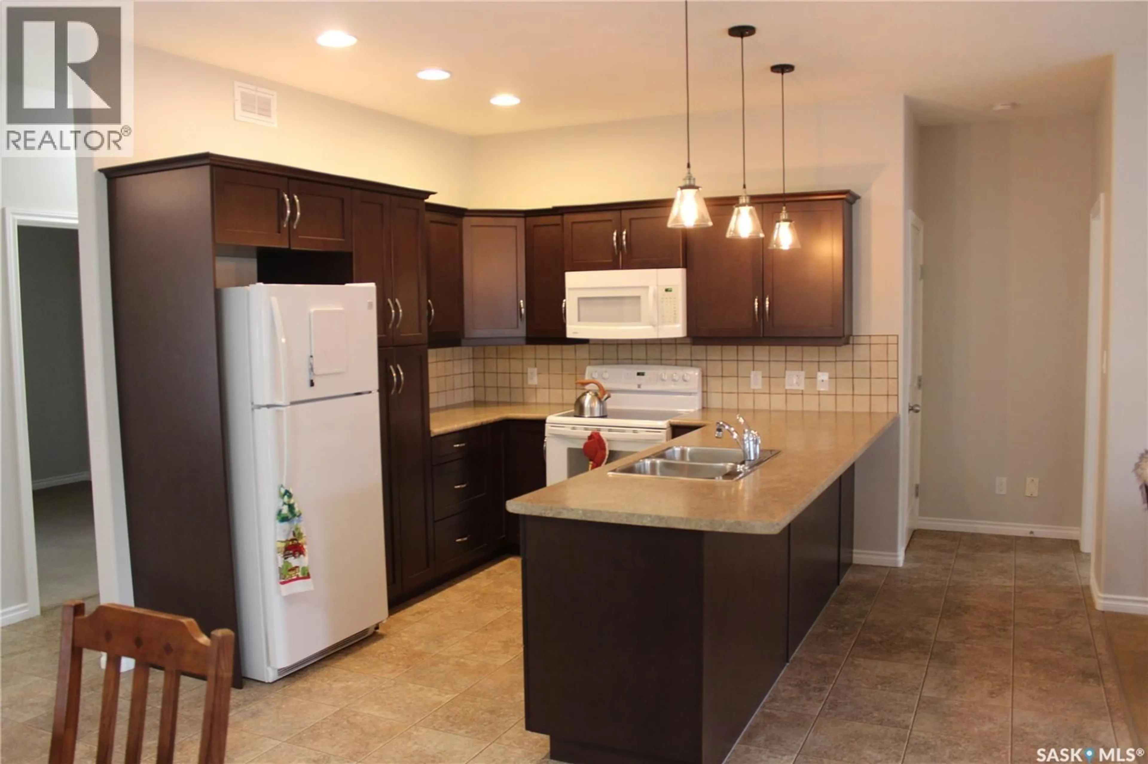 Standard kitchen, ceramic/tile floor for 108 ERICKSON STREET, Midale Saskatchewan S0C1S0
