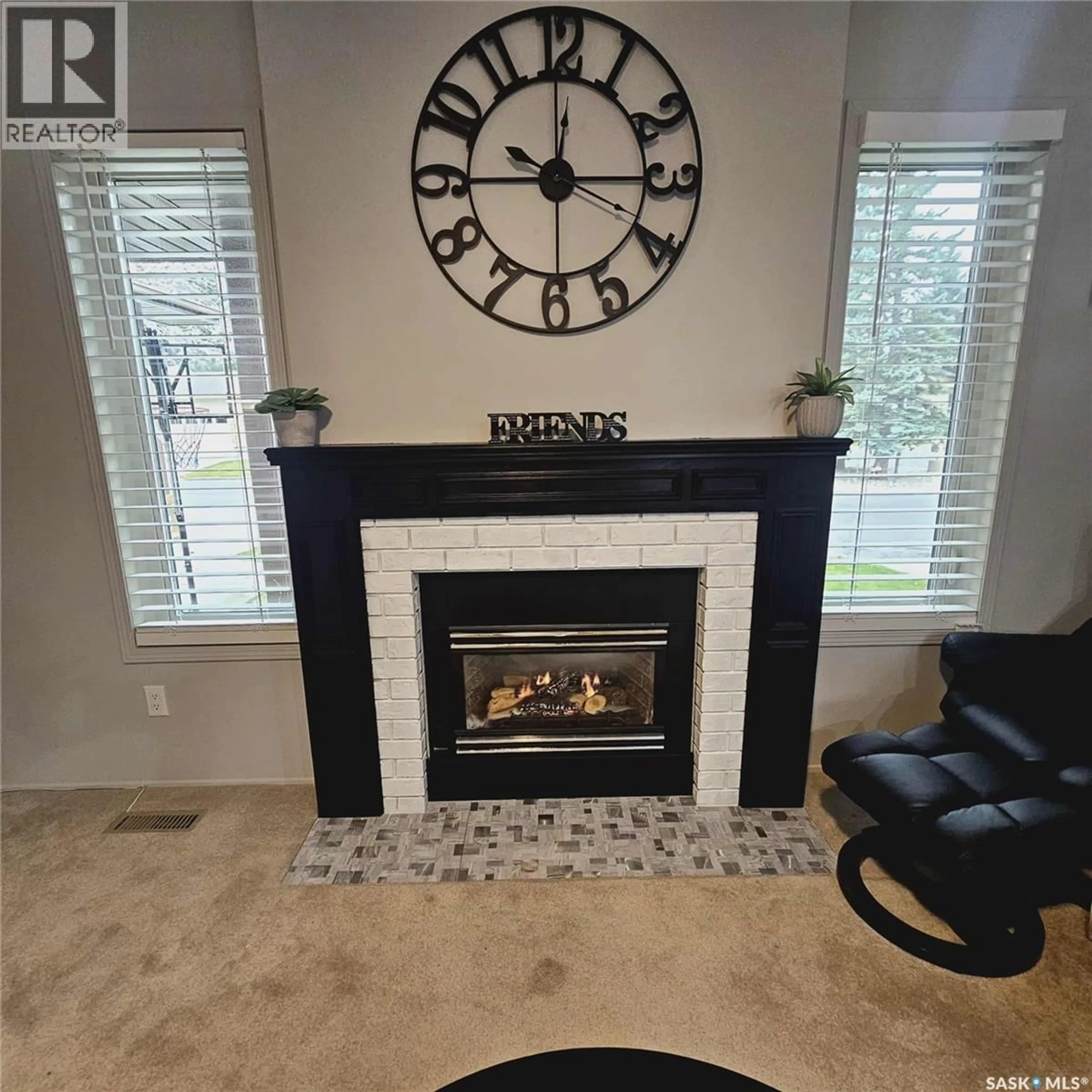 Living room with furniture, ceramic/tile floor for 3042 HUNTINGTON PLACE, Regina Saskatchewan S4V1Y1