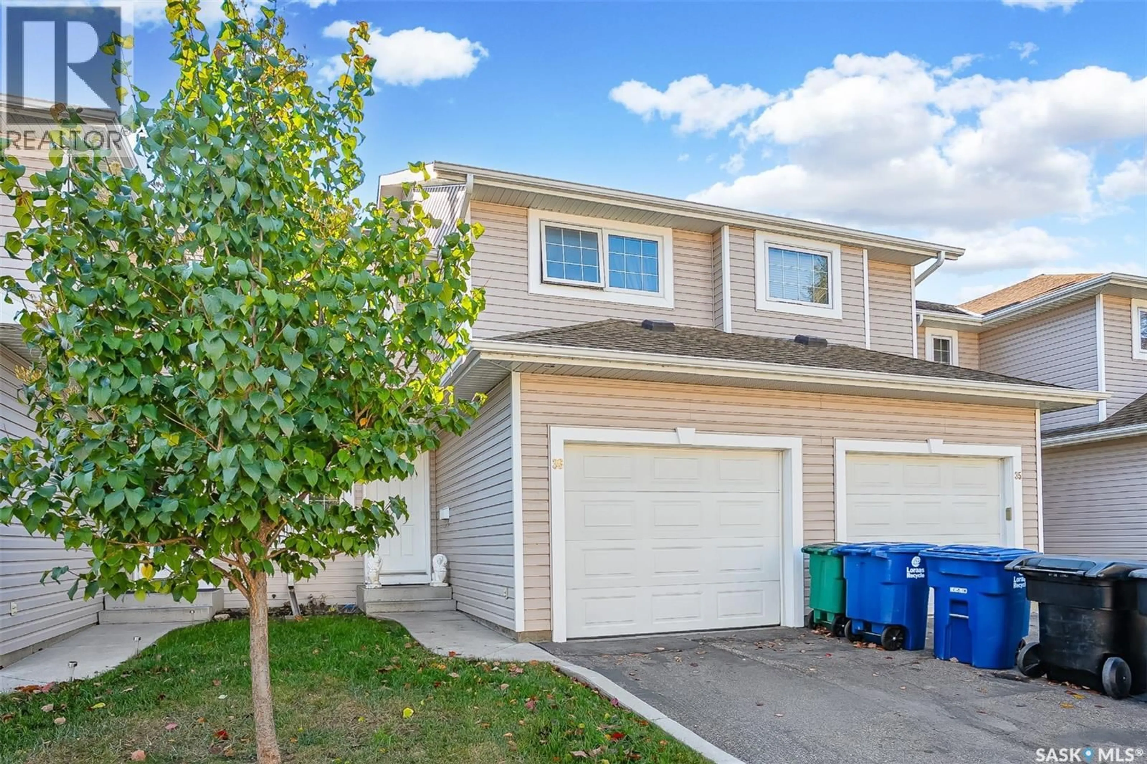 Home with vinyl exterior material, street for 36 215 PINEHOUSE DRIVE, Saskatoon Saskatchewan S7K6N9