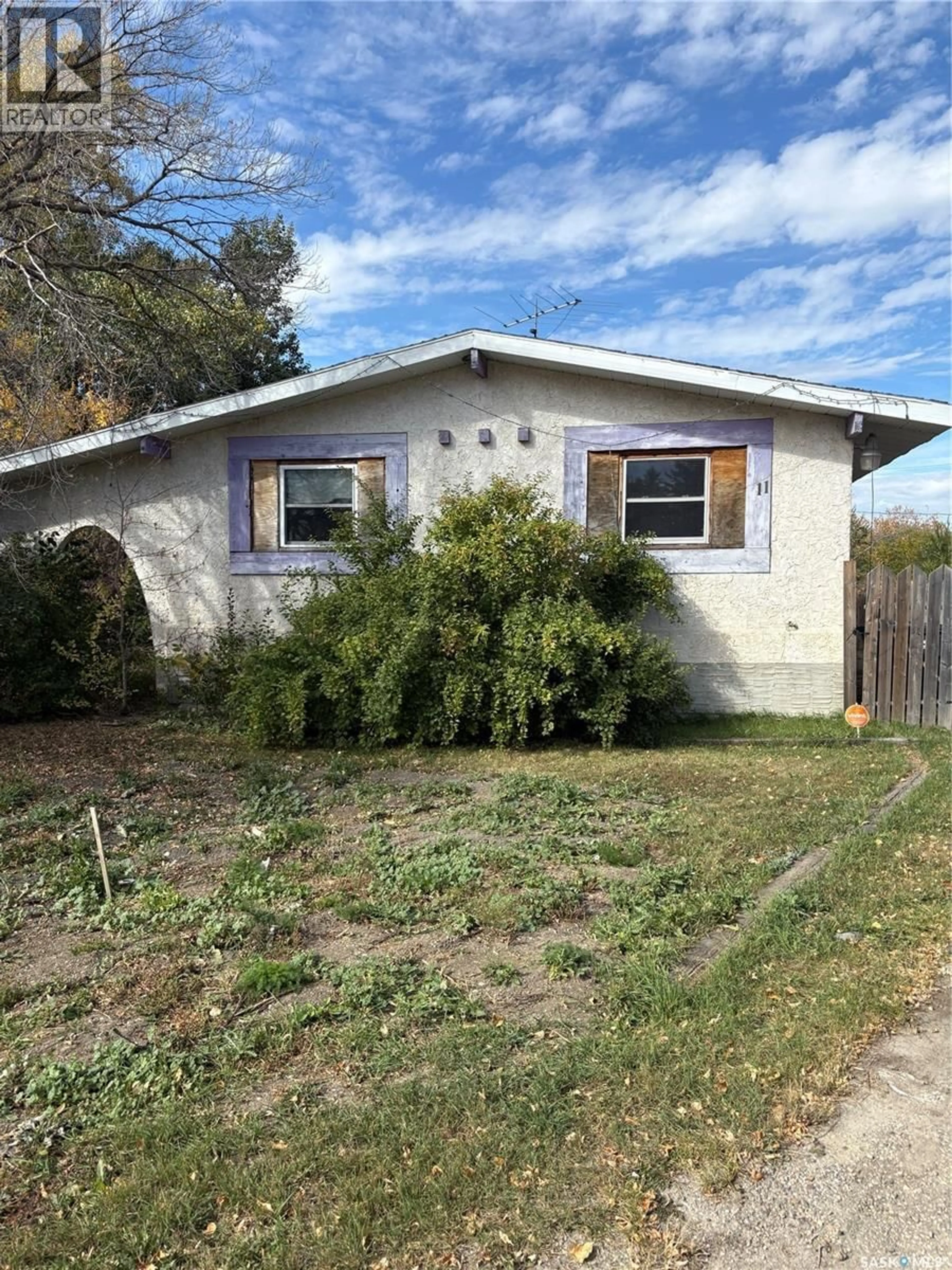 Home with vinyl exterior material, street for 11 COTTONWOOD PLACE, Pense Saskatchewan S0G3W0