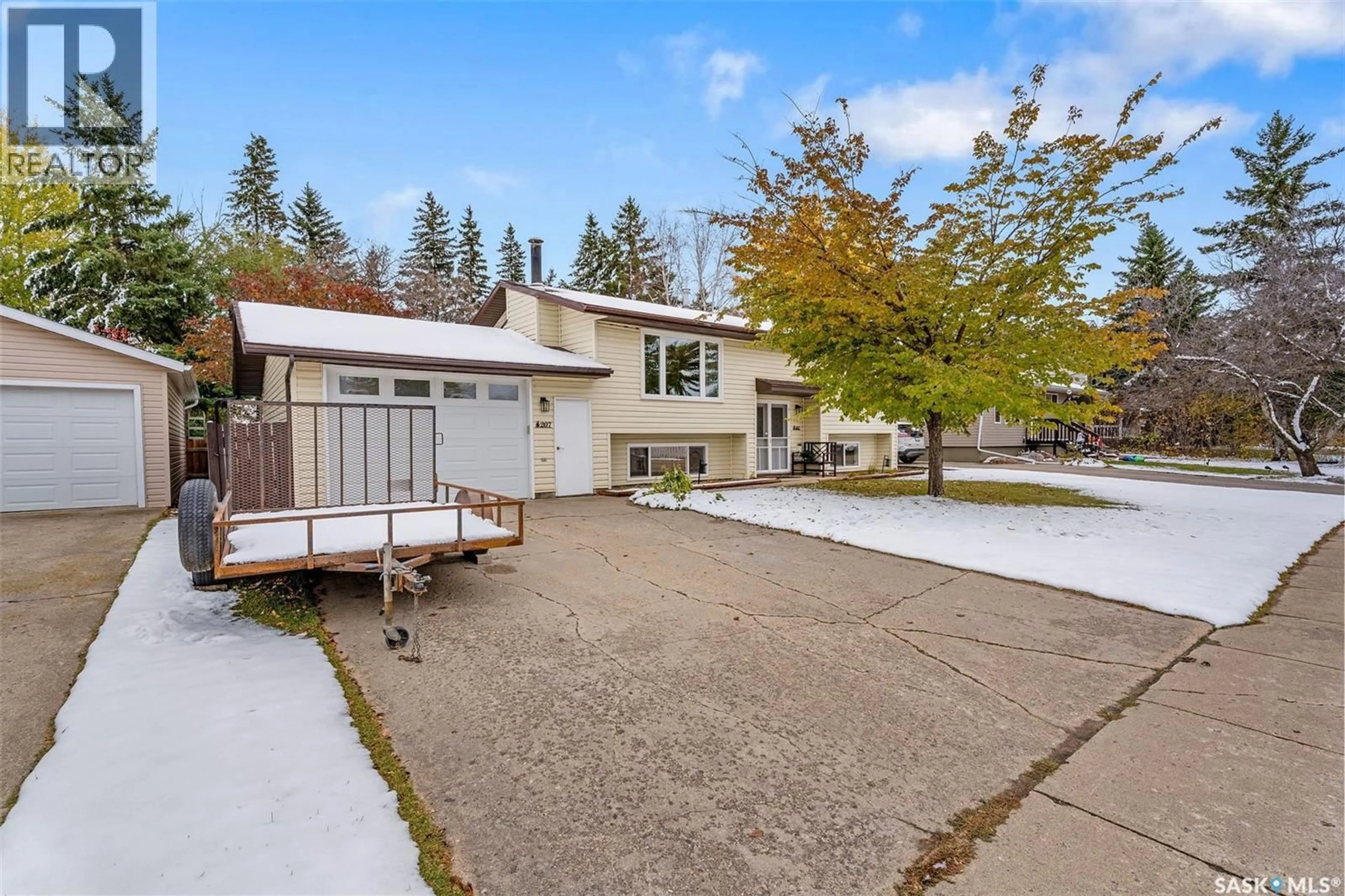 A pic from outside/outdoor area/front of a property/back of a property/a pic from drone, street for 207 MCCOSH DRIVE, Melfort Saskatchewan S0E1A0