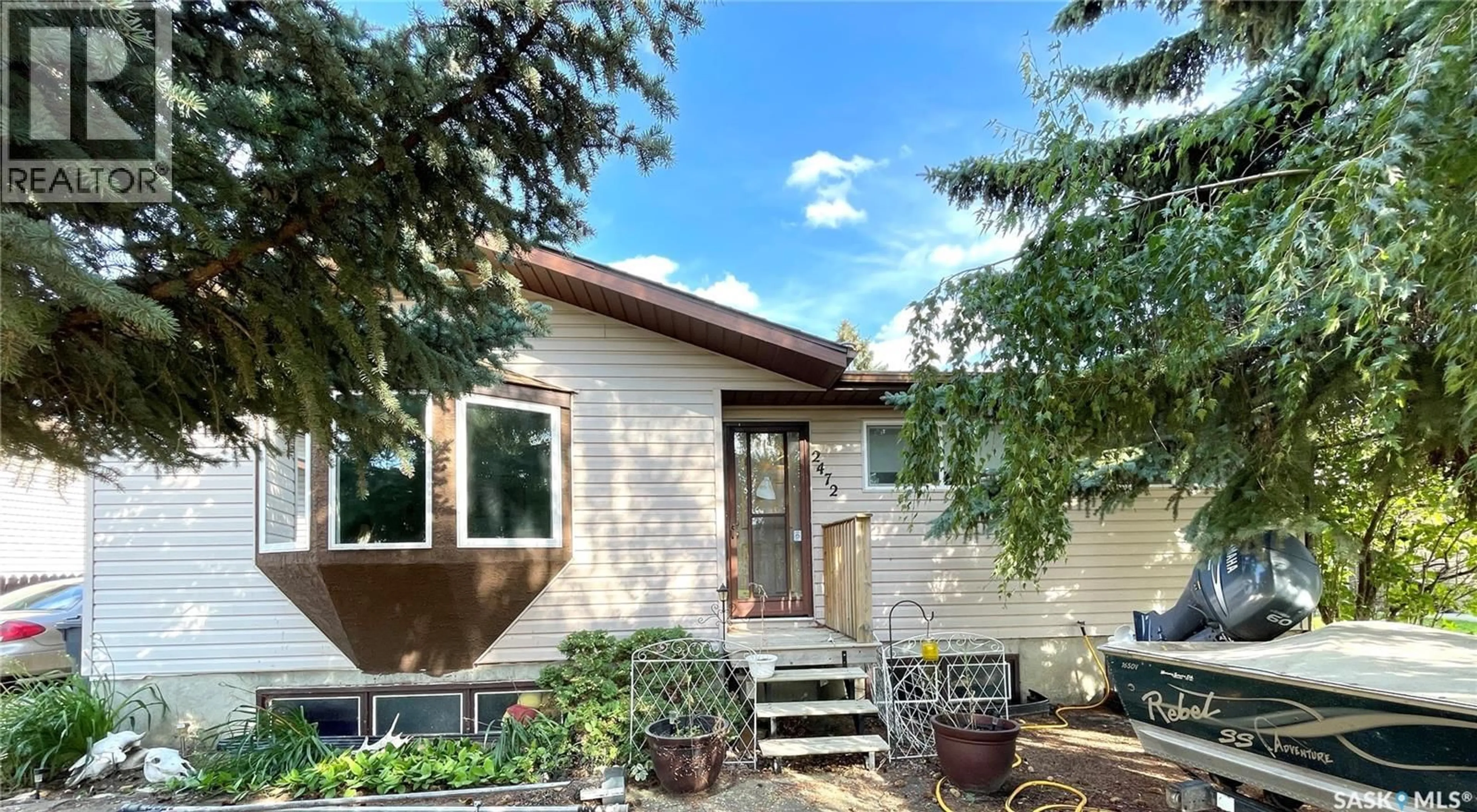 Home with vinyl exterior material, street for 2472 ROSS CRESCENT, North Battleford Saskatchewan S9A3R3