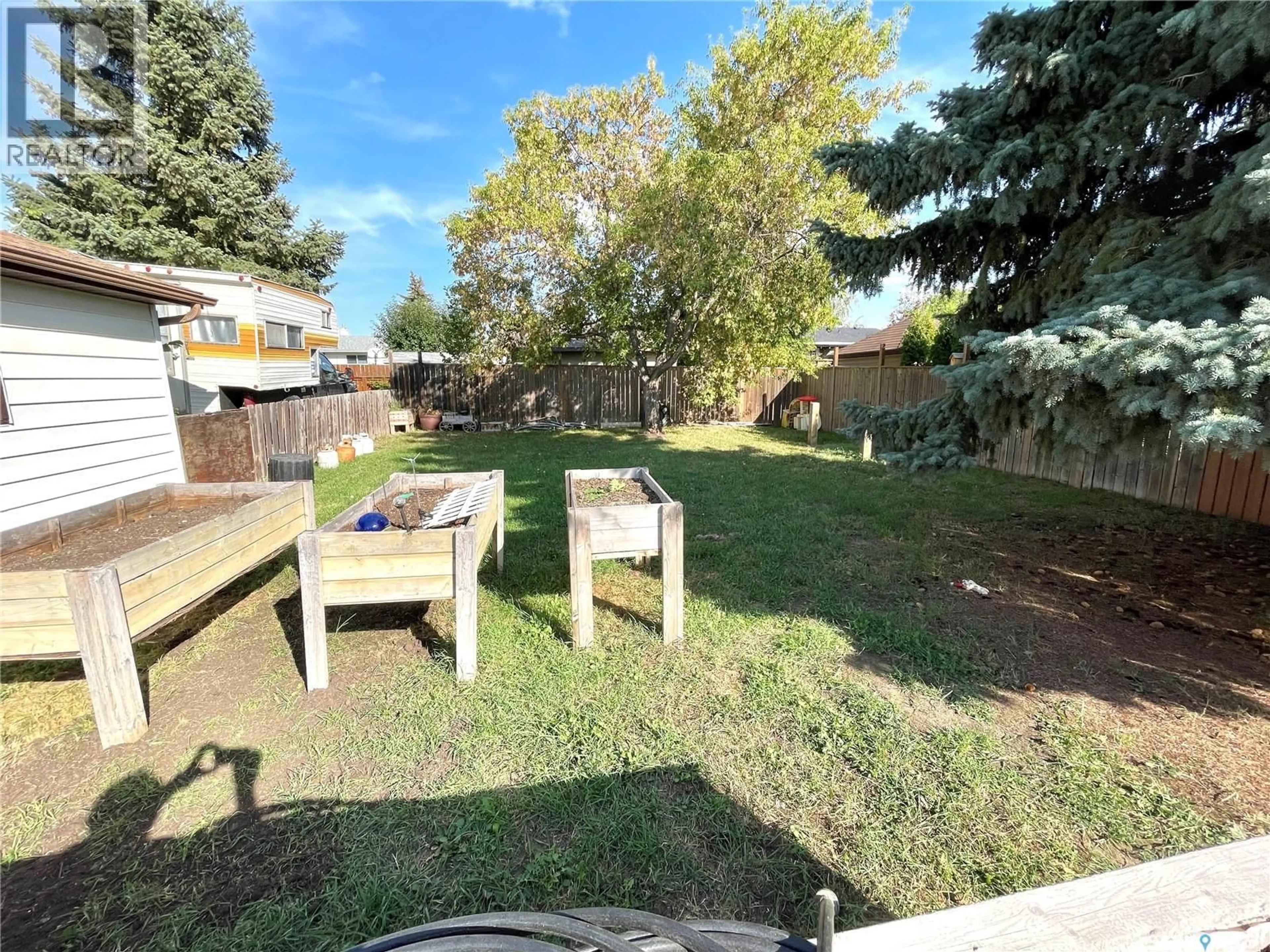 A pic from outside/outdoor area/front of a property/back of a property/a pic from drone, unknown for 2472 ROSS CRESCENT, North Battleford Saskatchewan S9A3R3