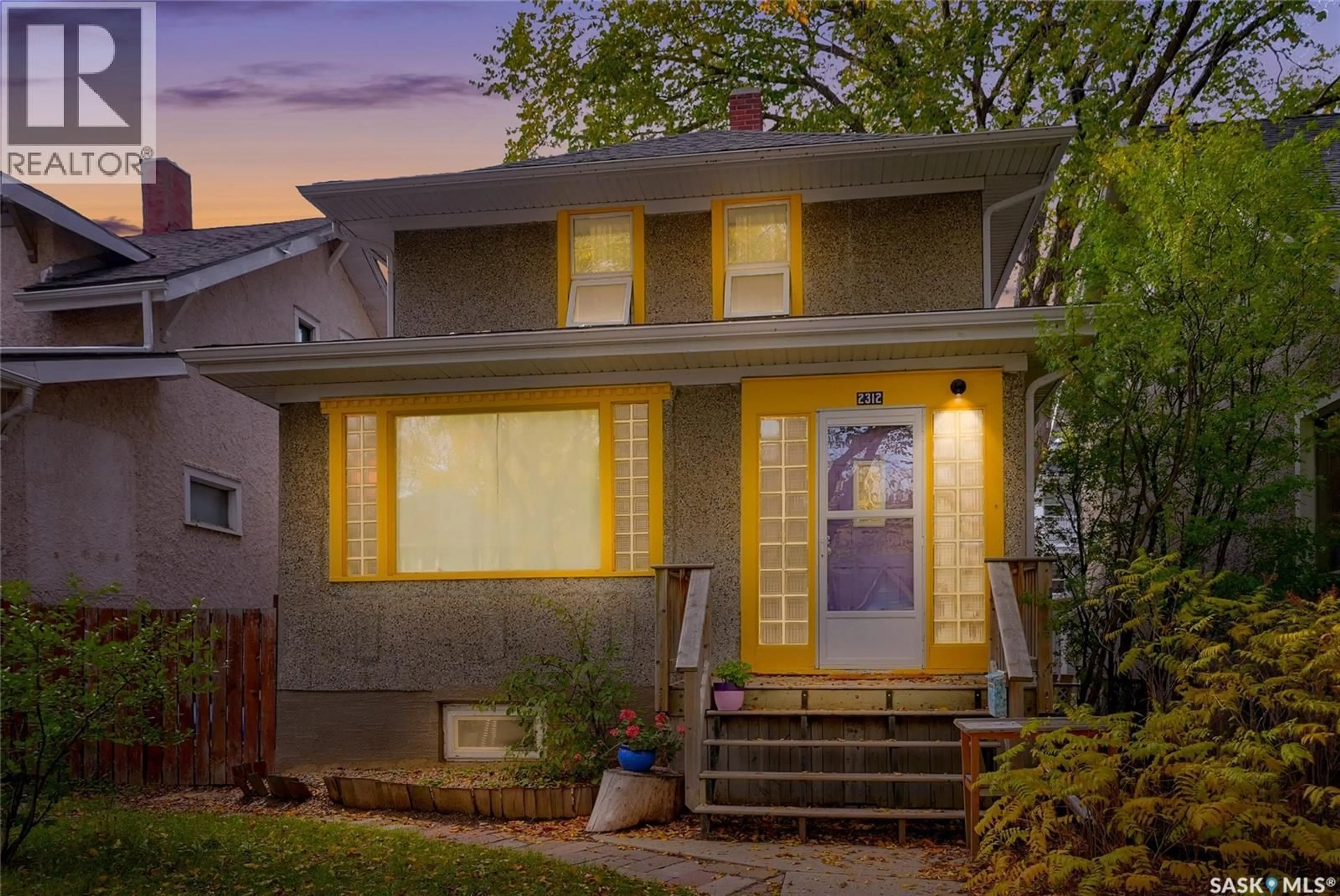 Home with vinyl exterior material, street for 2312 QUEBEC STREET, Regina Saskatchewan S4P1K4