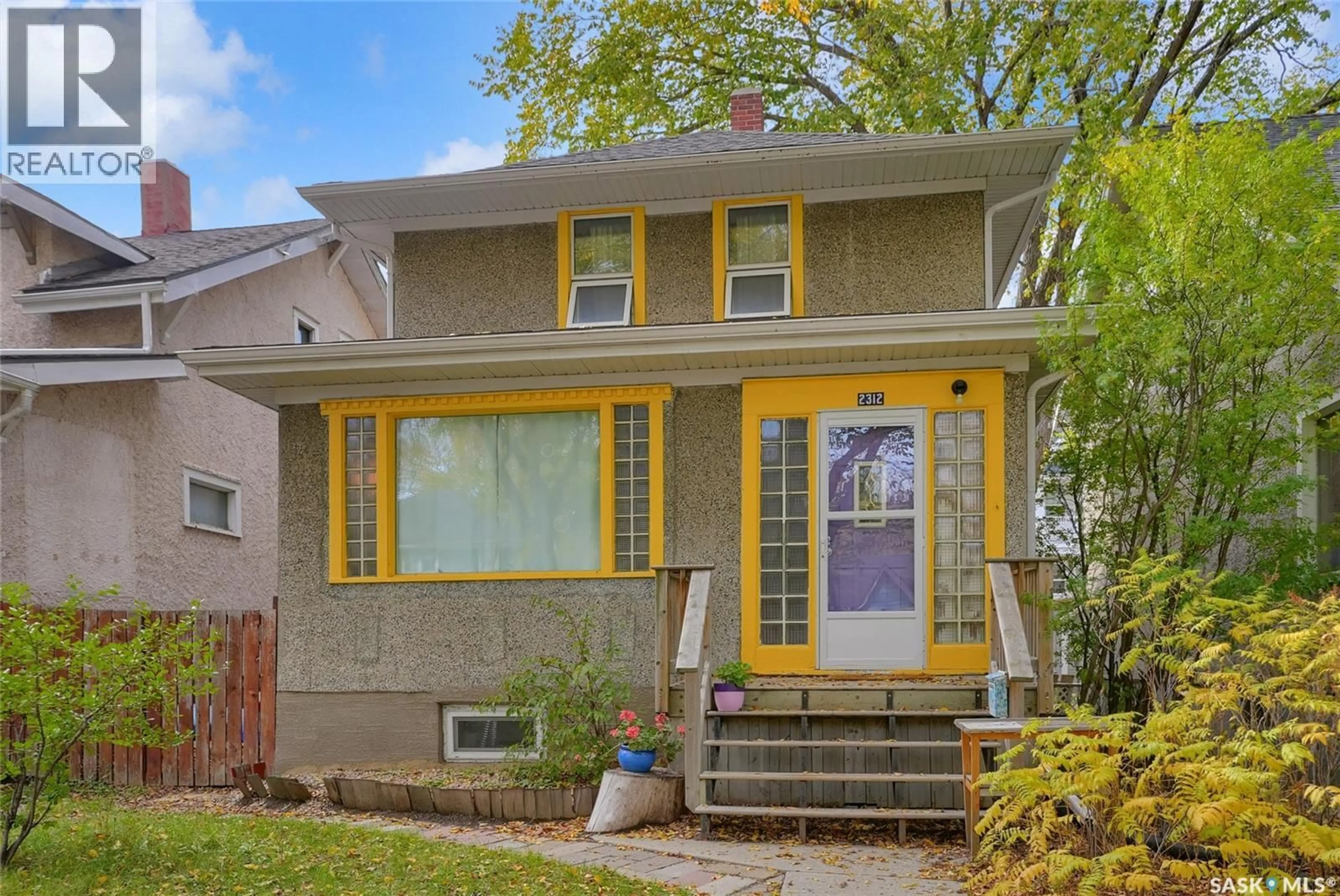 Home with vinyl exterior material, street for 2312 QUEBEC STREET, Regina Saskatchewan S4P1K4
