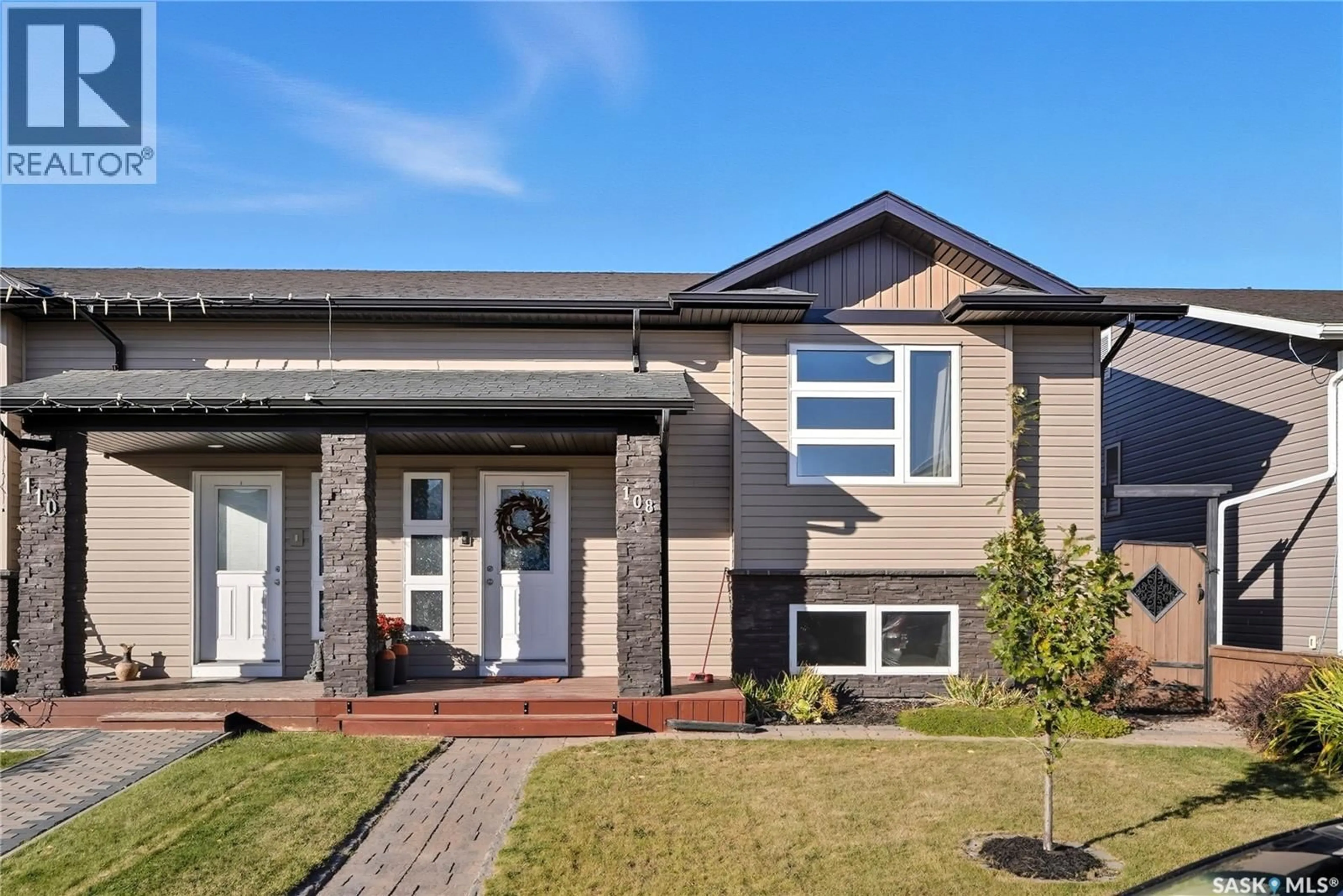 Home with brick exterior material, street for 108 REDDEKOPP CRESCENT, Warman Saskatchewan S0K4S3