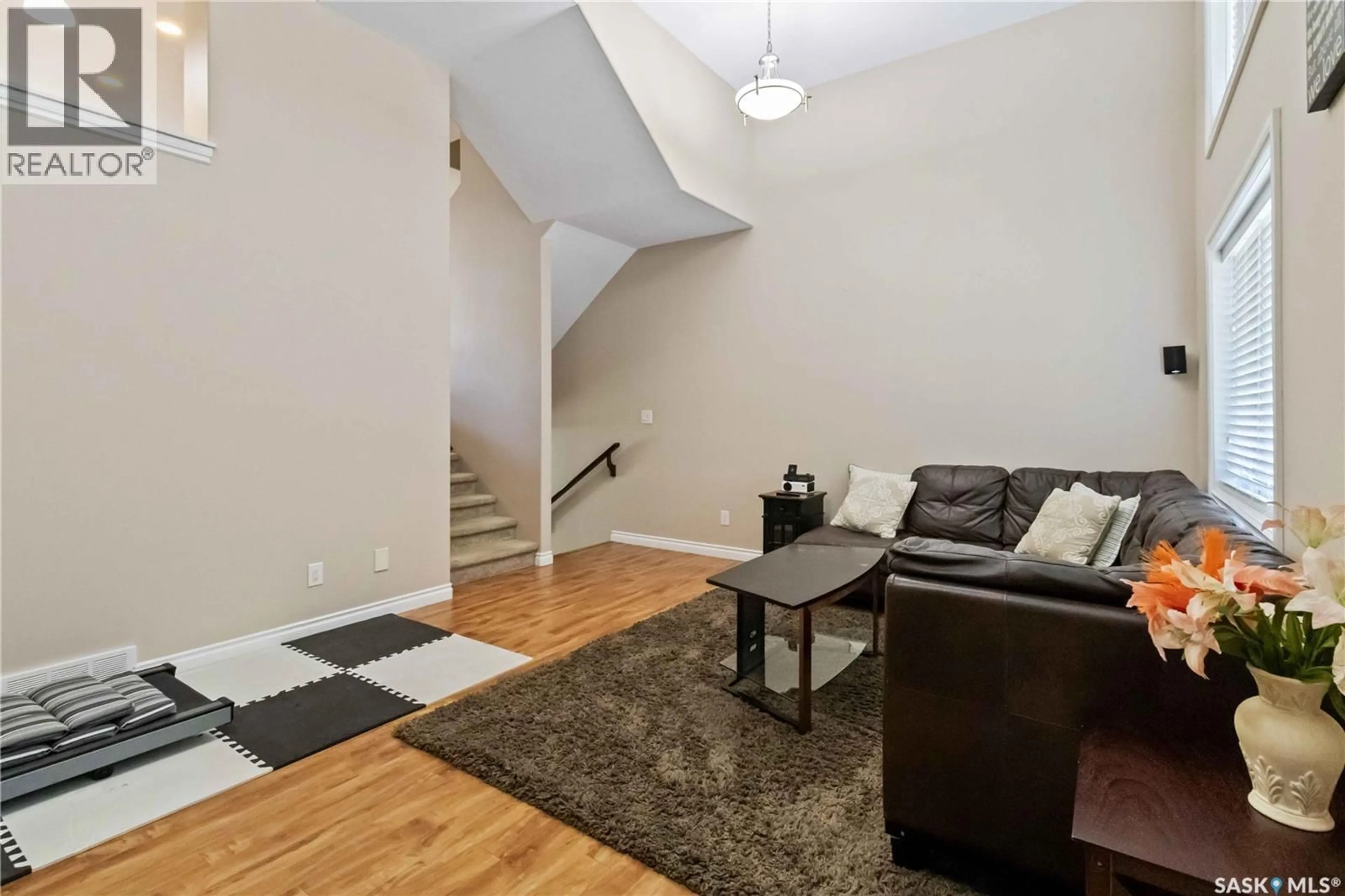 Living room with furniture, unknown for 212 - 505 212 WILLIS CRESCENT, Saskatoon Saskatchewan S7T0R7