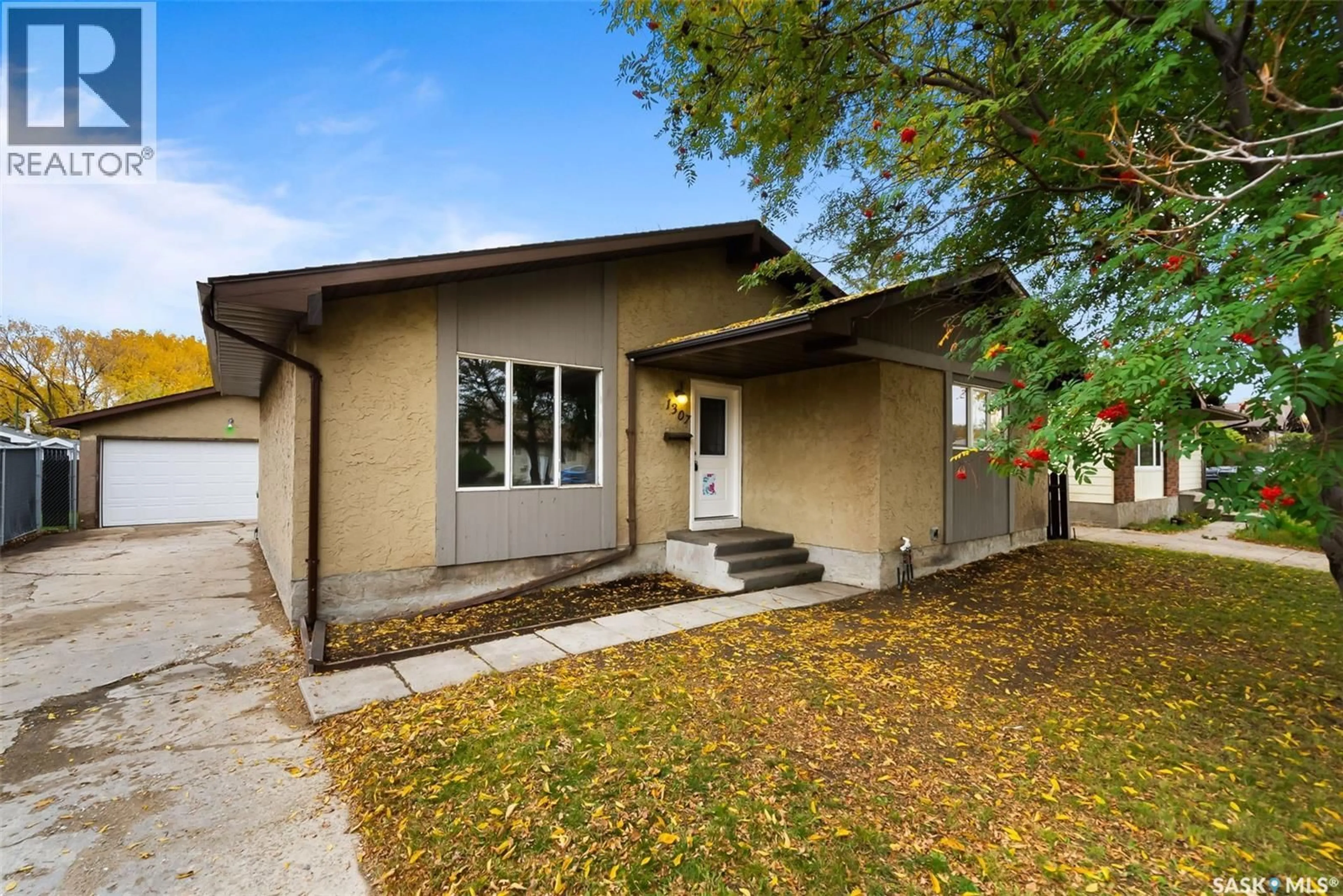 Home with vinyl exterior material, street for 1307 FLEET STREET, Regina Saskatchewan S4N5R4