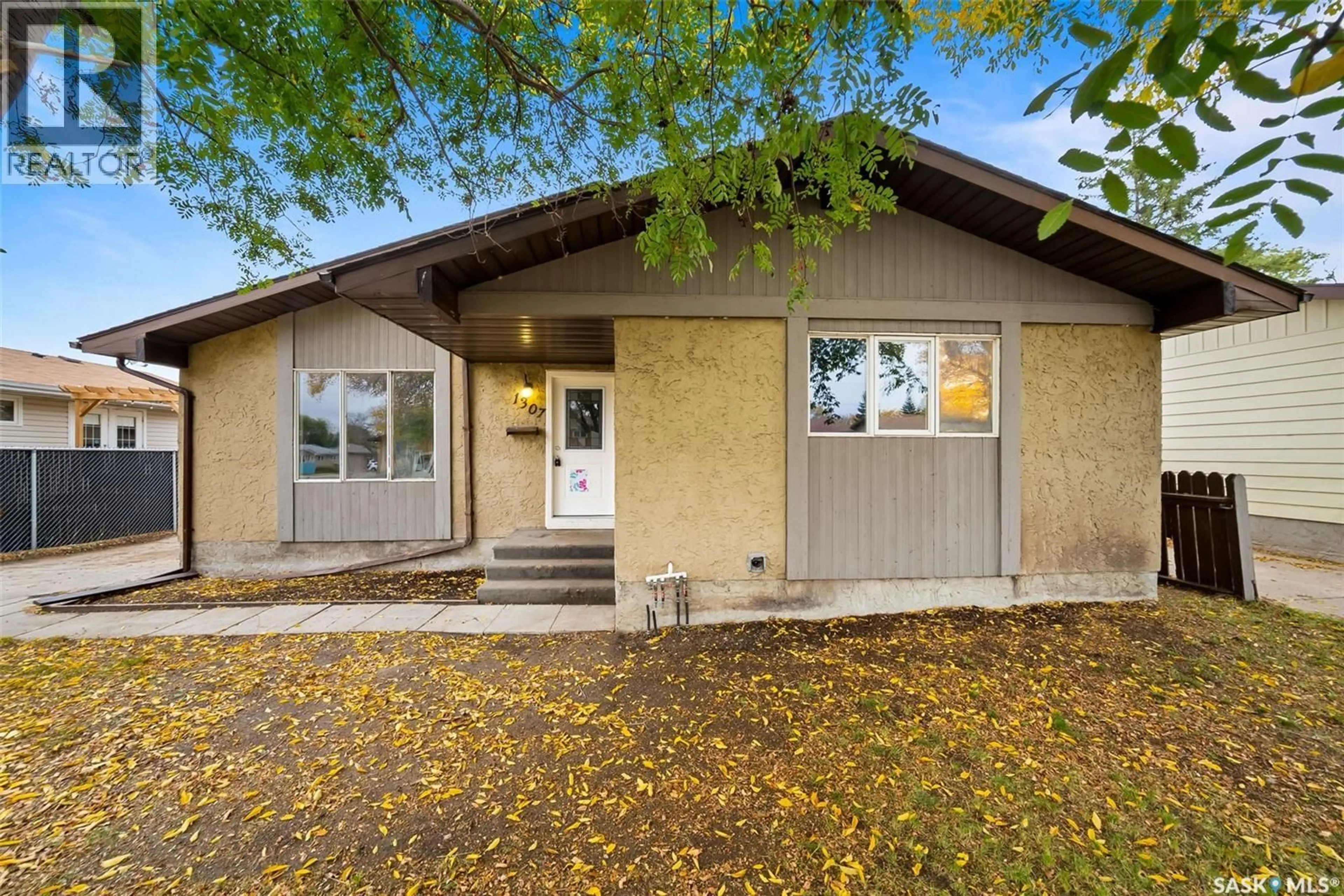 Home with vinyl exterior material, street for 1307 FLEET STREET, Regina Saskatchewan S4N5R4