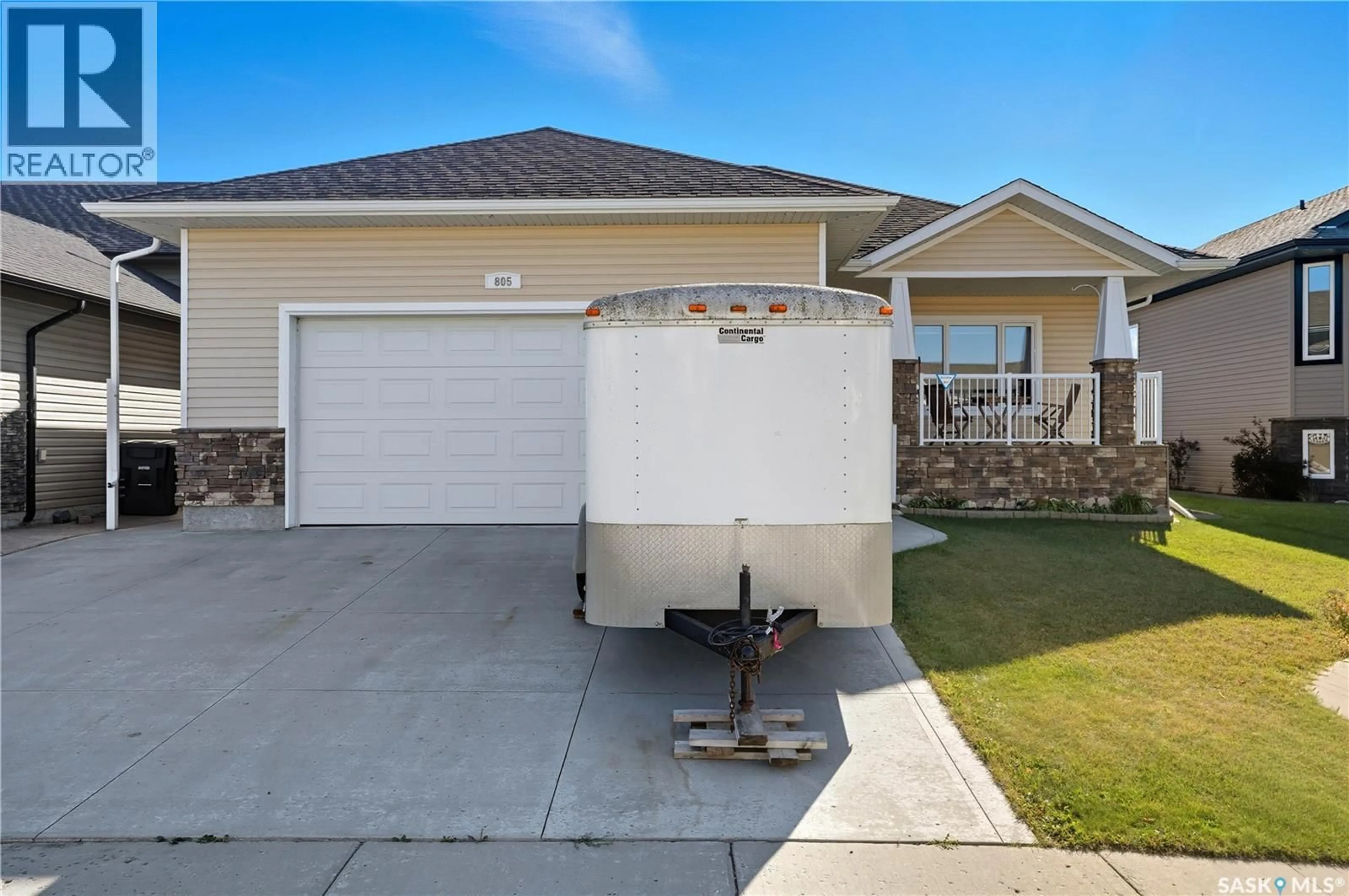 Home with vinyl exterior material, street for 805 WEISDORFF PLACE, Warman Saskatchewan S0K4S2