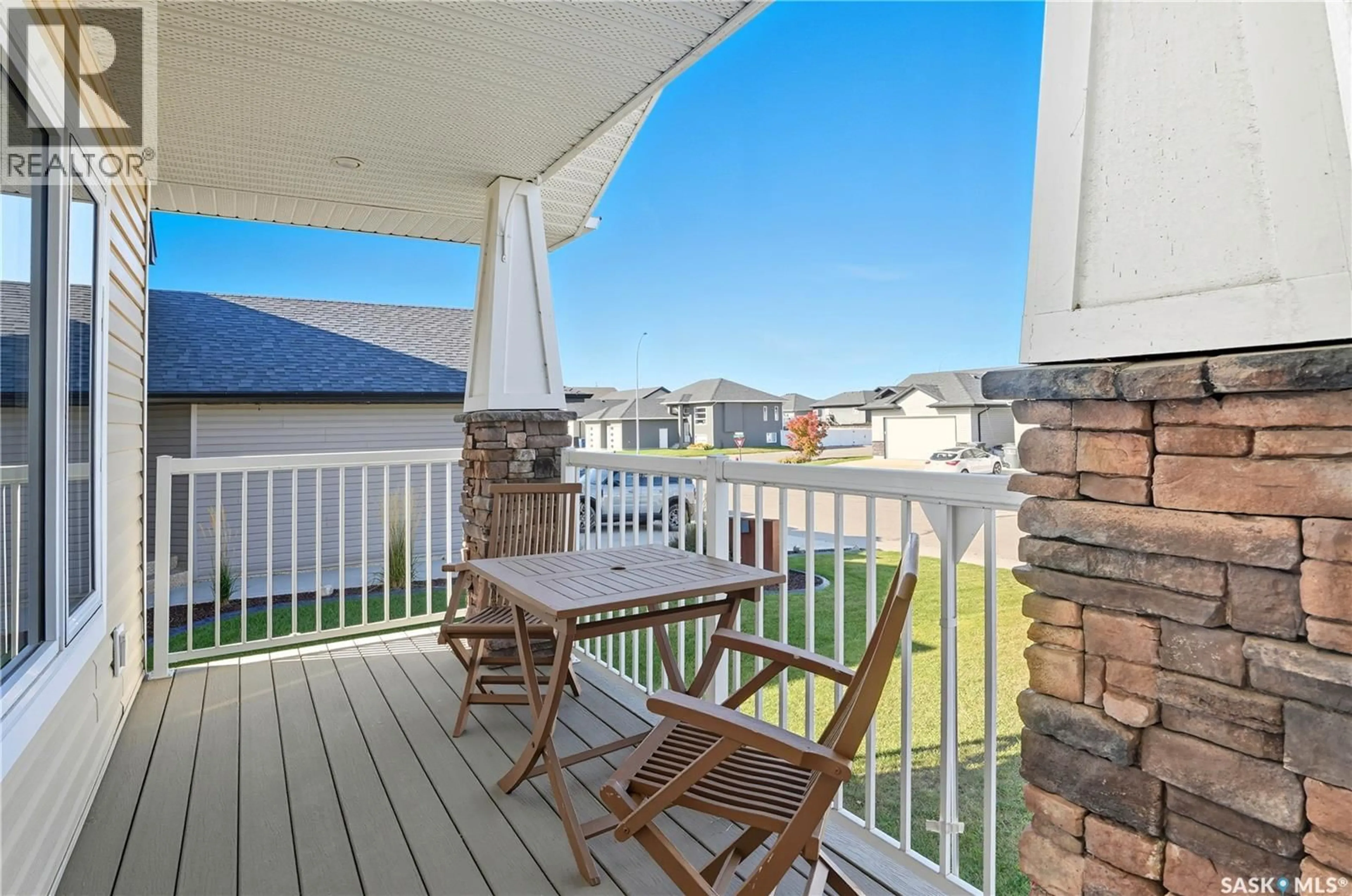 Patio, water/lake/river/ocean view for 805 WEISDORFF PLACE, Warman Saskatchewan S0K4S2