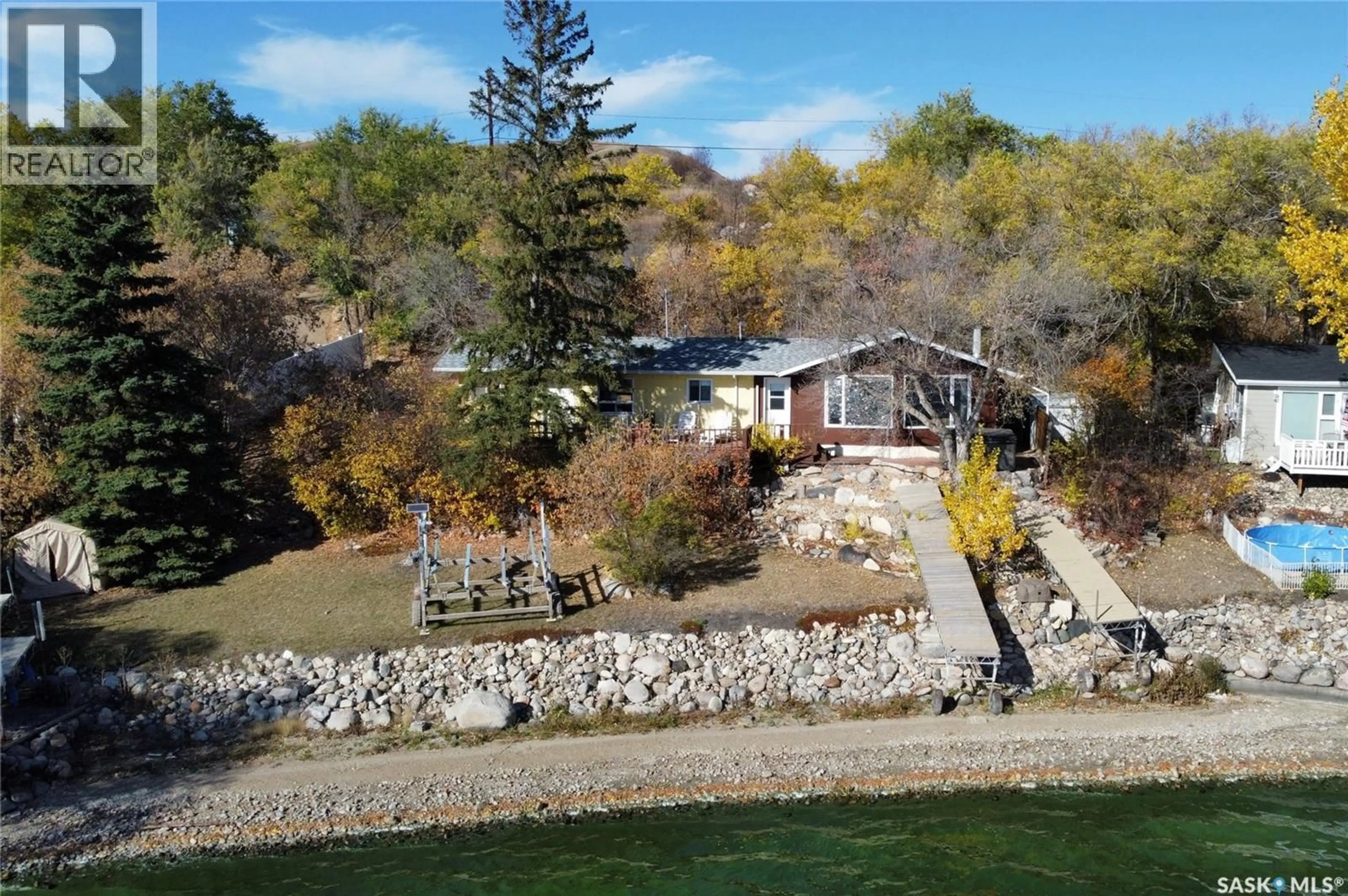 A pic from outside/outdoor area/front of a property/back of a property/a pic from drone, water/lake/river/ocean view for 446 PASQUA LAKE ROAD, North Qu'Appelle Rm No. 187 Saskatchewan S0G1S0