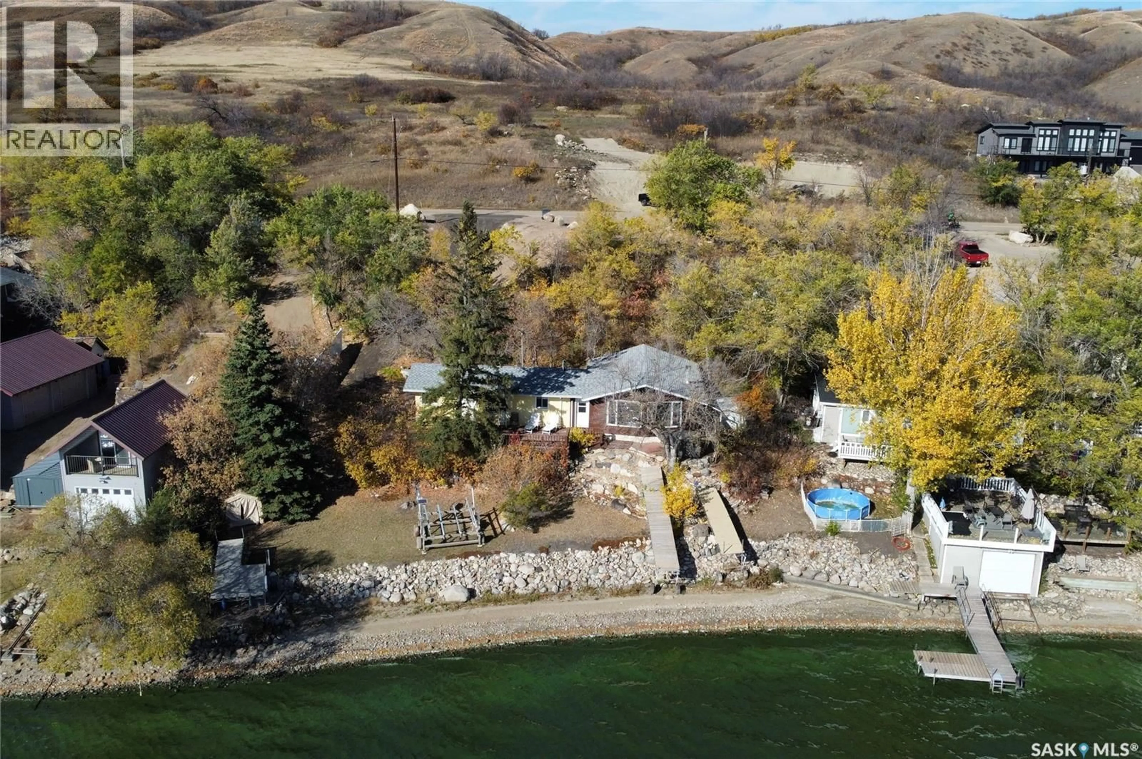 A pic from outside/outdoor area/front of a property/back of a property/a pic from drone, water/lake/river/ocean view for 446 PASQUA LAKE ROAD, North Qu'Appelle Rm No. 187 Saskatchewan S0G1S0