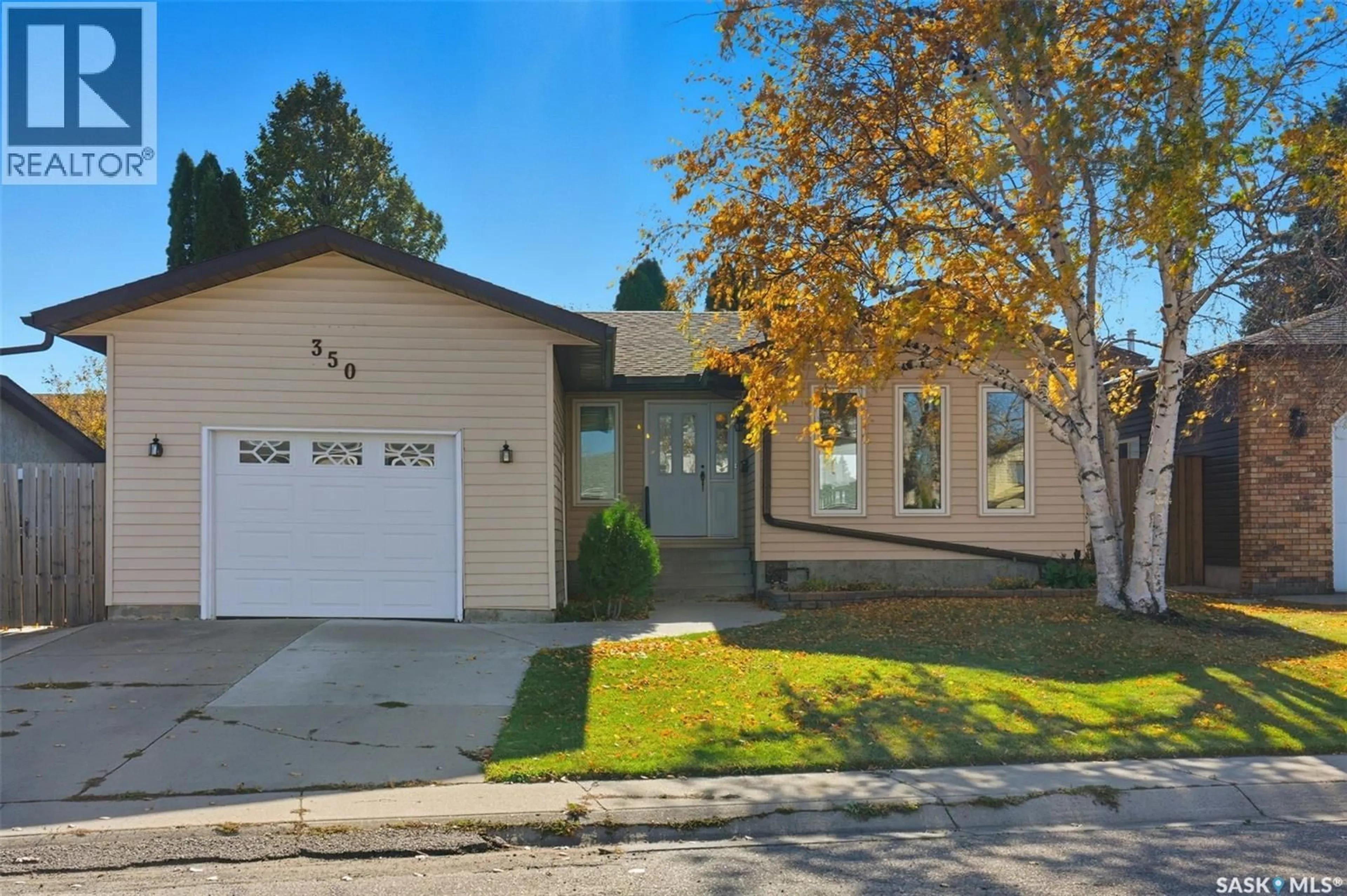 Home with vinyl exterior material, street for 350 MARCOTTE CRESCENT, Saskatoon Saskatchewan S7K7N8