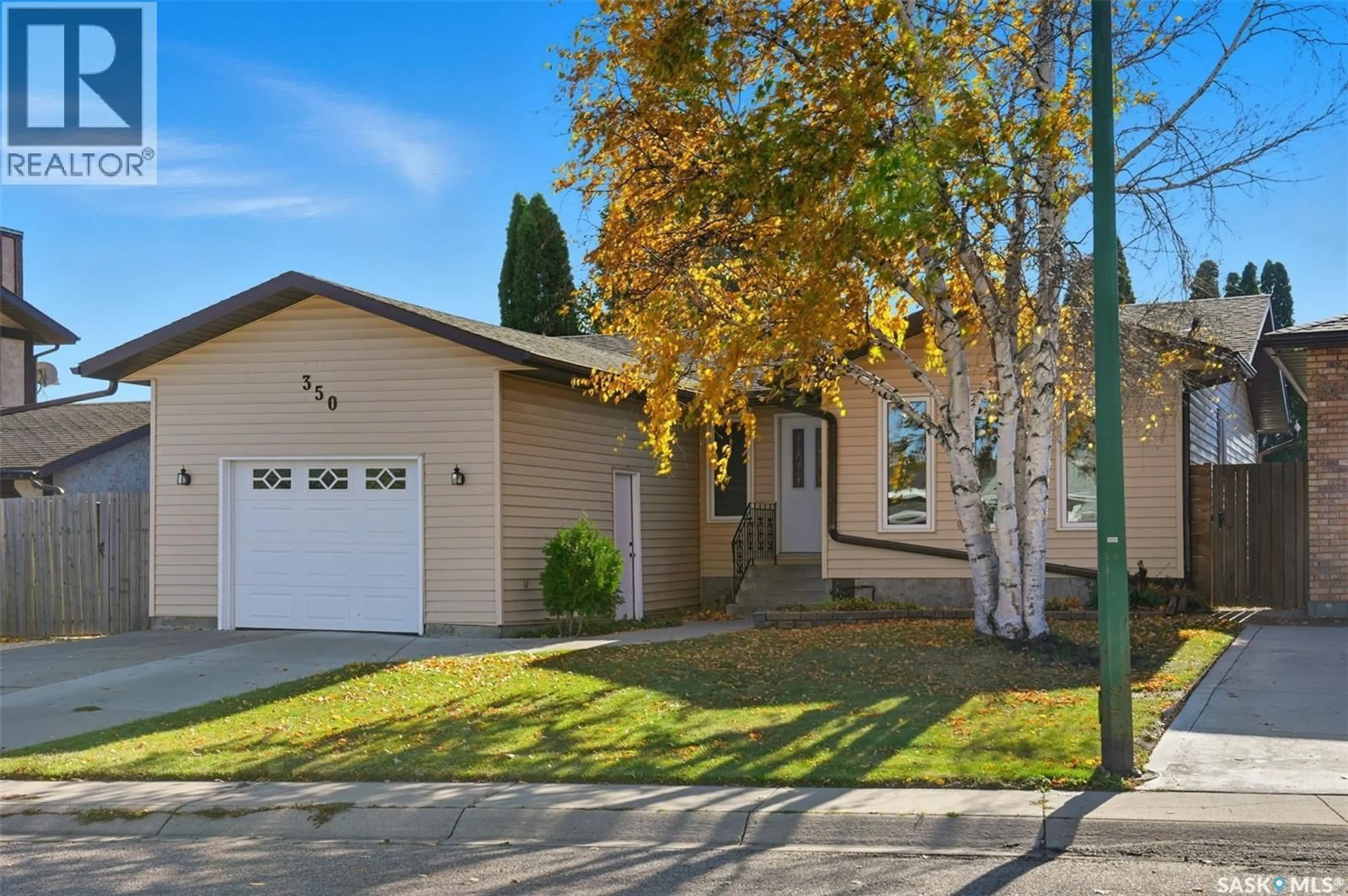 Home with vinyl exterior material, street for 350 MARCOTTE CRESCENT, Saskatoon Saskatchewan S7K7N8