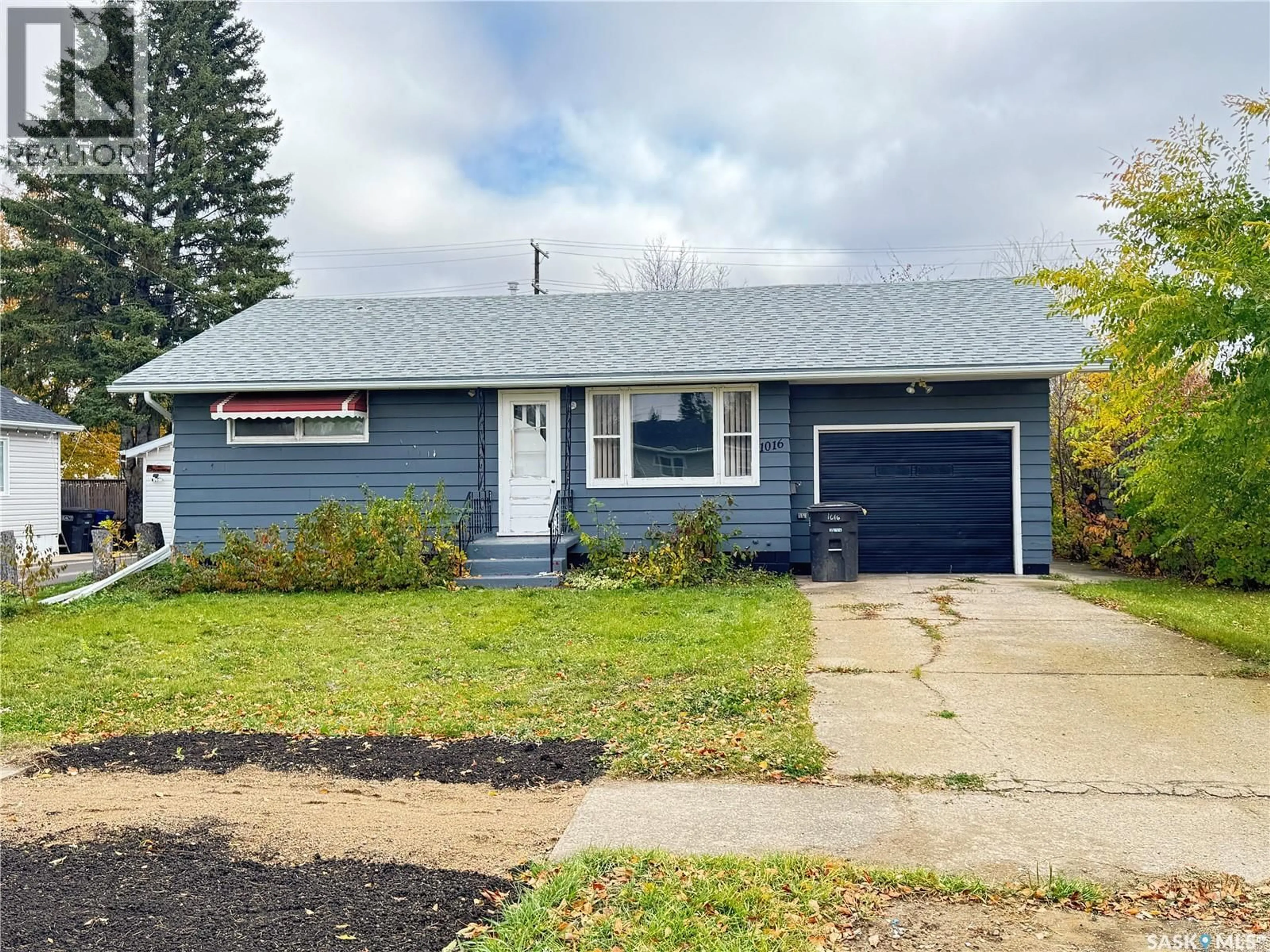 Home with vinyl exterior material, street for 1016 10TH STREET, Humboldt Saskatchewan S0K2A0