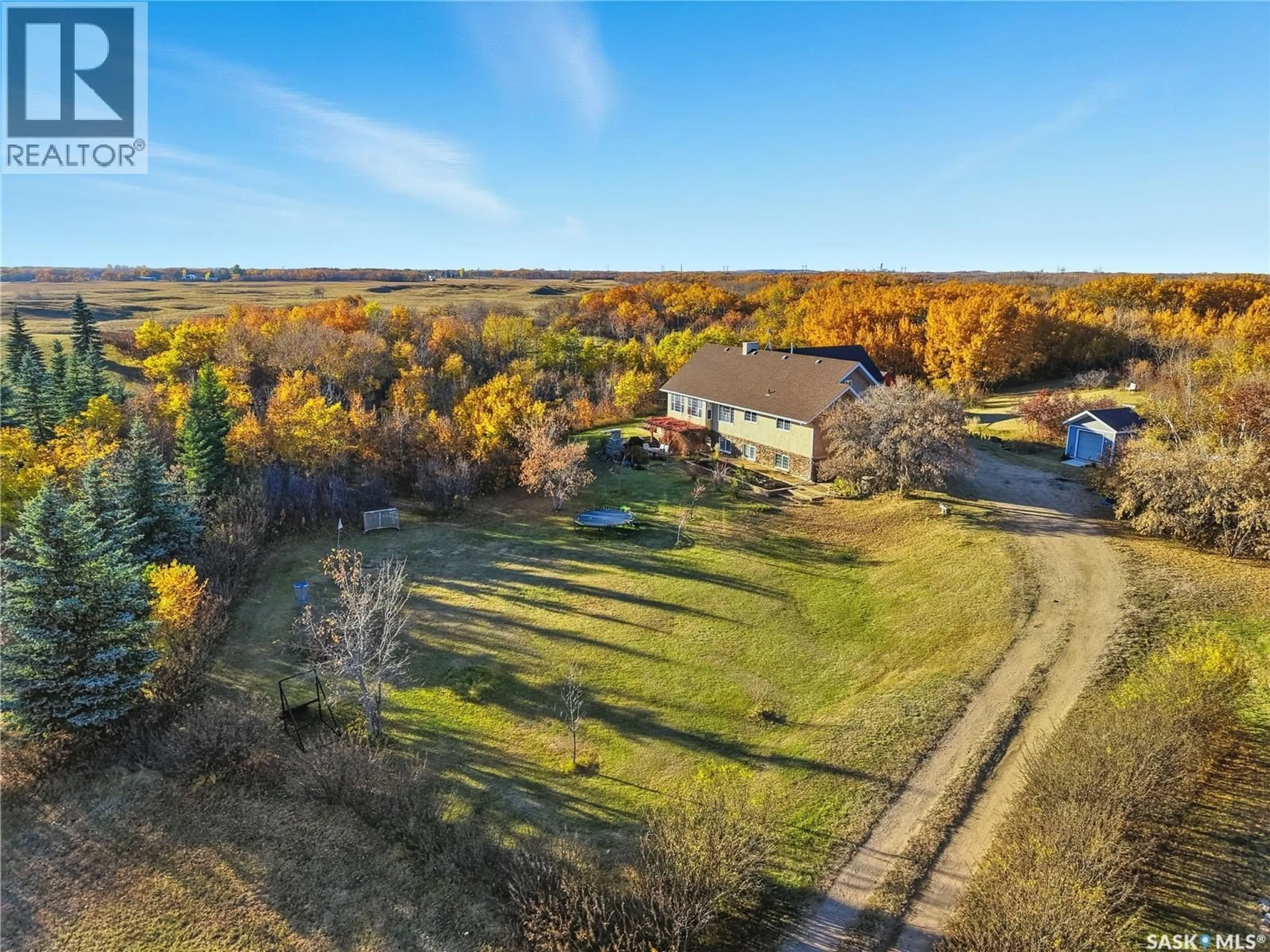 A pic from outside/outdoor area/front of a property/back of a property/a pic from drone, forest/trees view for 3 GIBSON COURT, Corman Park Rm No. 344 Saskatchewan S7K3J6