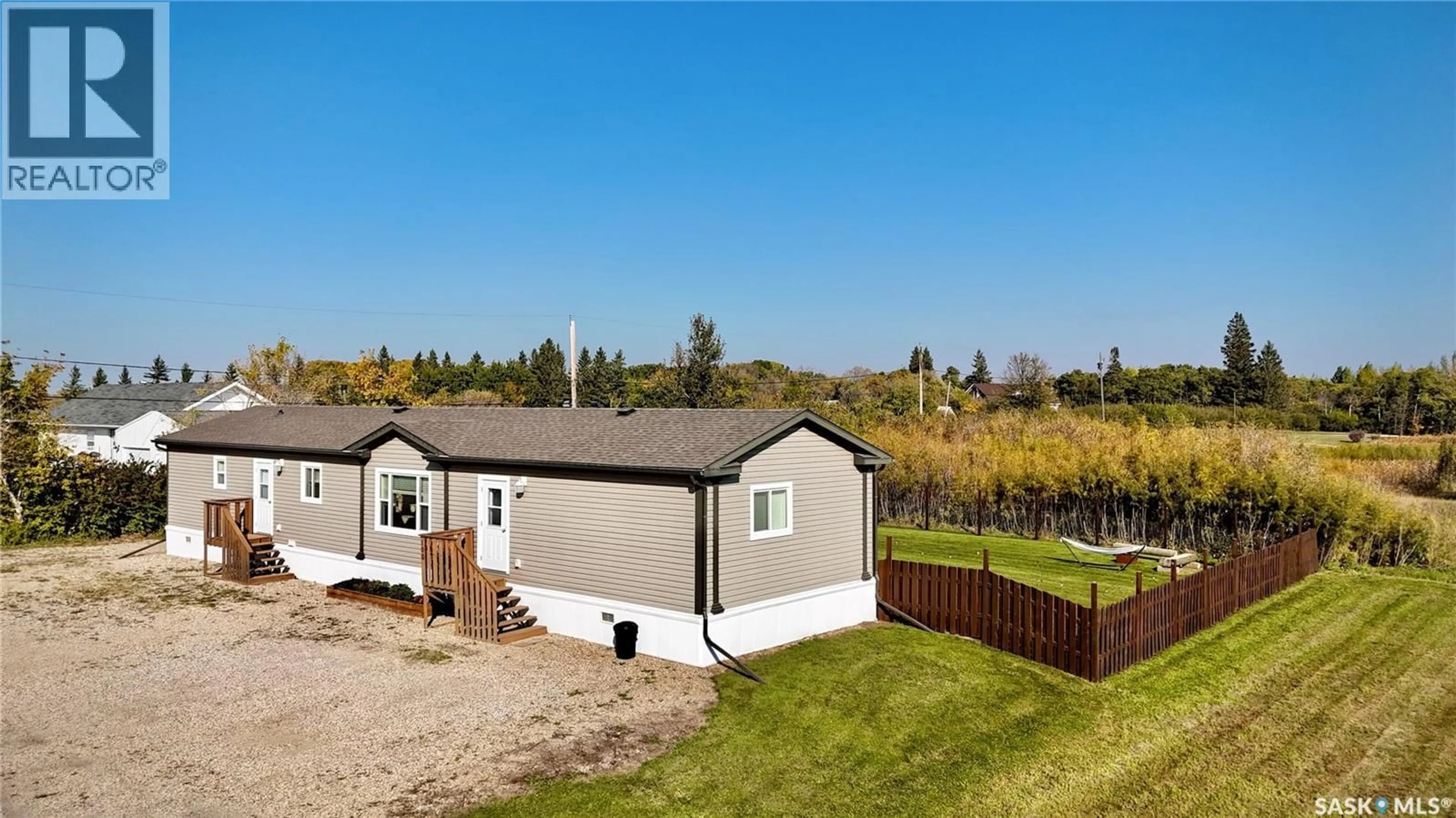 A pic from outside/outdoor area/front of a property/back of a property/a pic from drone, unknown for 100 MACDONALD STREET, Stockholm Saskatchewan S0A3Y0