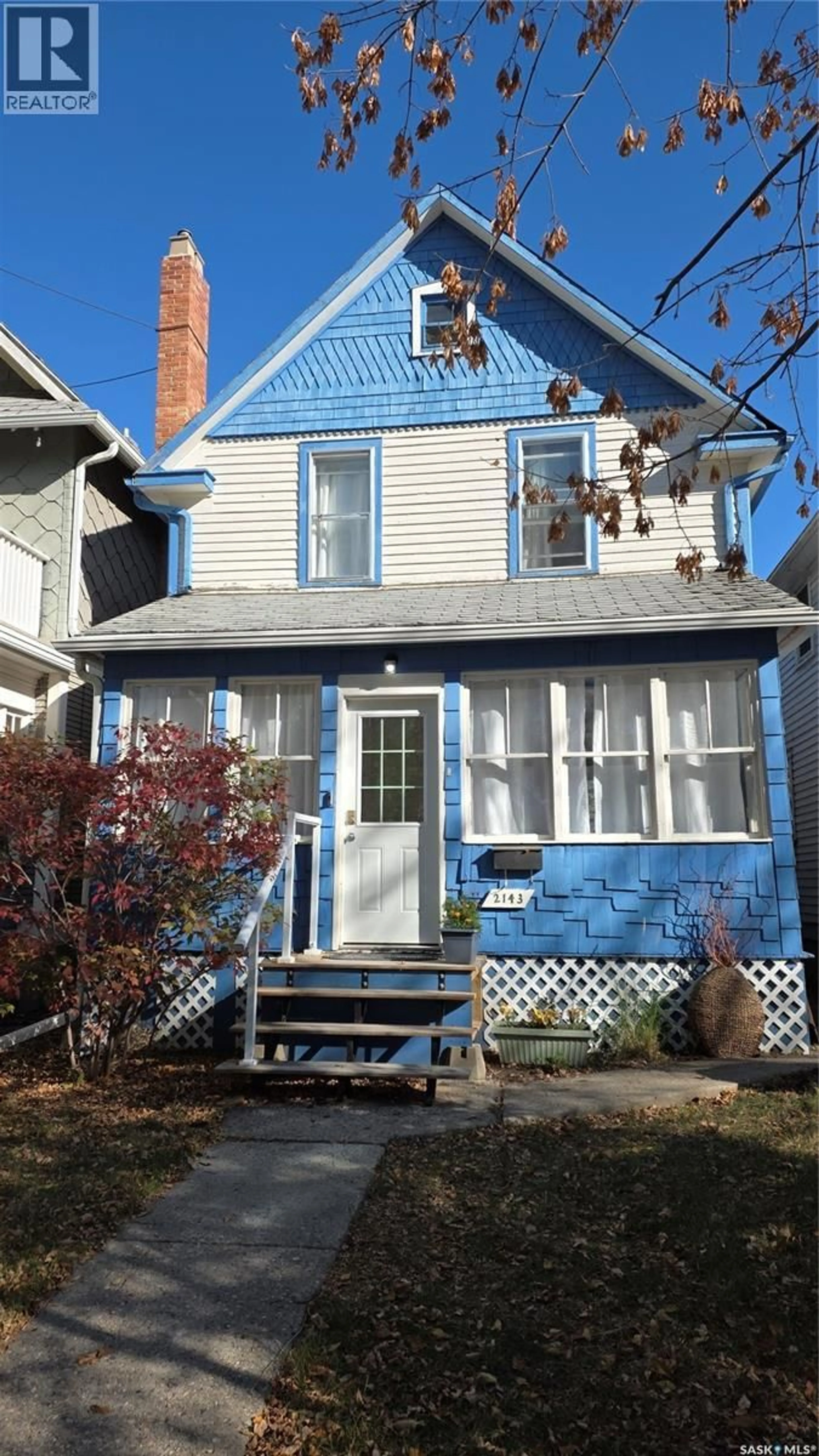 Home with vinyl exterior material, street for 2143 CAMERON STREET, Regina Saskatchewan S4T2V7