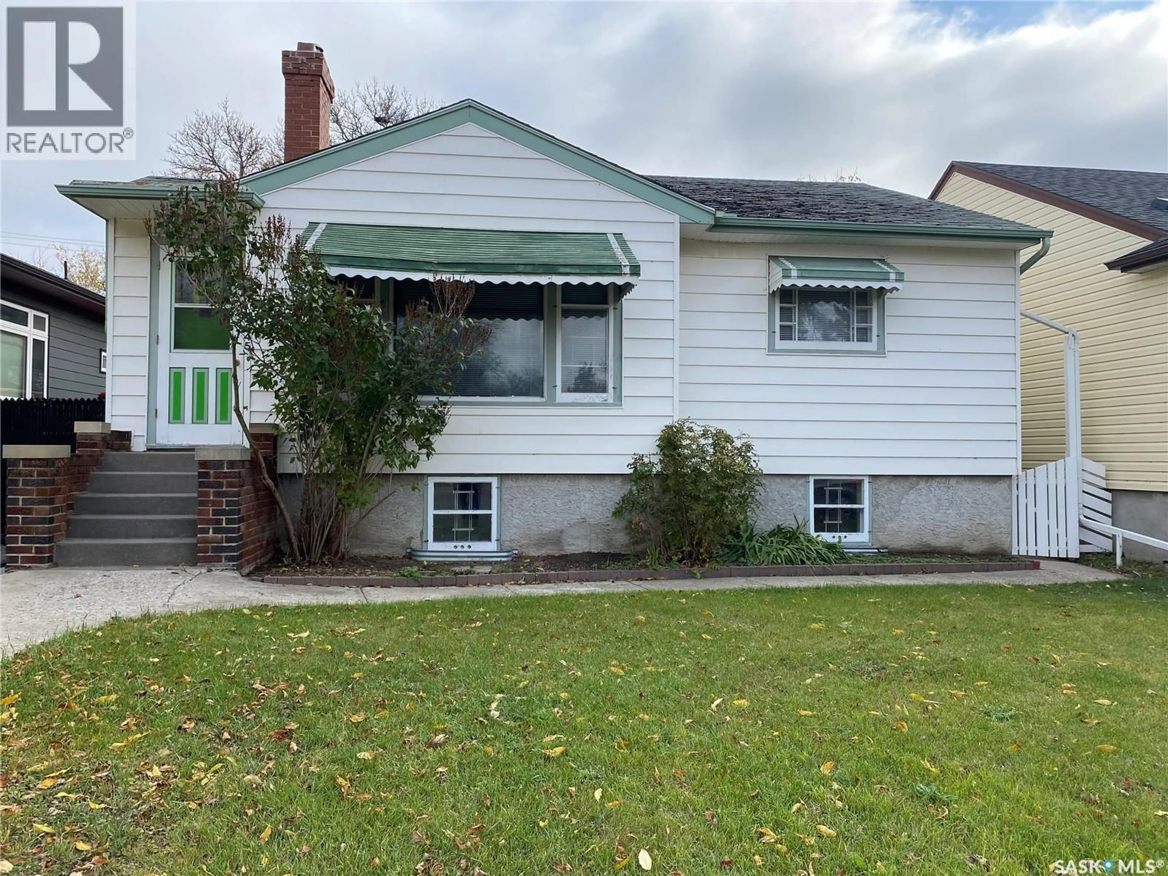 Home with vinyl exterior material, street for 2645 WINNIPEG STREET, Regina Saskatchewan S4P1H8